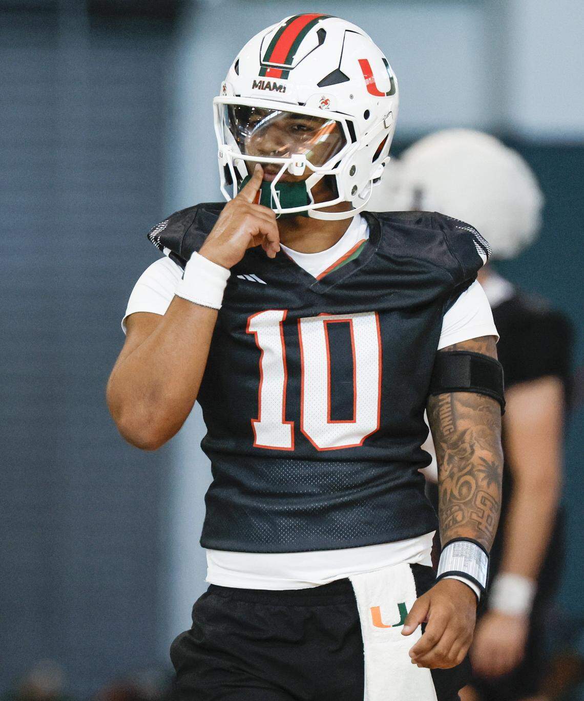 Miami Hurricanes quarterback Darian Mensah (10) prepares to run drills at the Carol Soffer Indoor Practice Facility on the Uinversity of Miami campus in Coral Gables, Florida, on Tuesday morning, March 24, 2026.