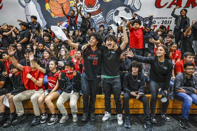 Students, David Trinidad, Sebastian Recendiz, and Sarah Alonso, jump up in celebration of Earth Day as the Miami Heat began the day's events with a pep rally at Driftwood Middle School in Hollywood, Florida, on Thursday, April 9, 2026. Miami Heat's efforts aim to bolster Driftwood's environmental programs and curriculum, which have already earned the school national and state recognition.