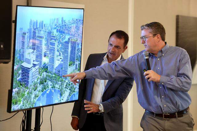 Fort Lauderdale Mayor Dean Trantalis and Director of Development Services Anthony Fajardo go over a drawing of the Galleria mega-project during a town hall meeting at the Coral Ridge Yacht Club on Tuesday, Oct. 28, 2025.