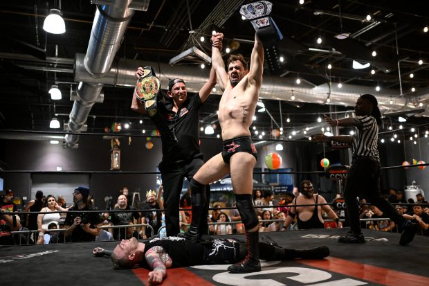 Alex Levy stands above Alex Xcean during Bash at the Brew at The Tank Brewing Company on Friday, March 6, 2026, in Miami, Florida. (Michele Eve Sandberg/Contributor)