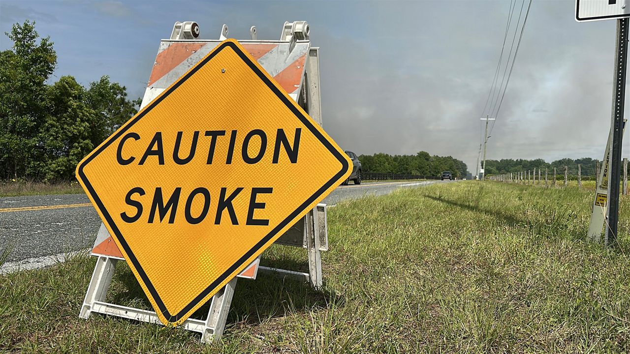 The National Weather Service has issued a fire weather warning for several counties, including Lake County where crews were working to contain a 120-acre brush fire in Umatilla on Monday. (Spectrum News/Nick Allen)