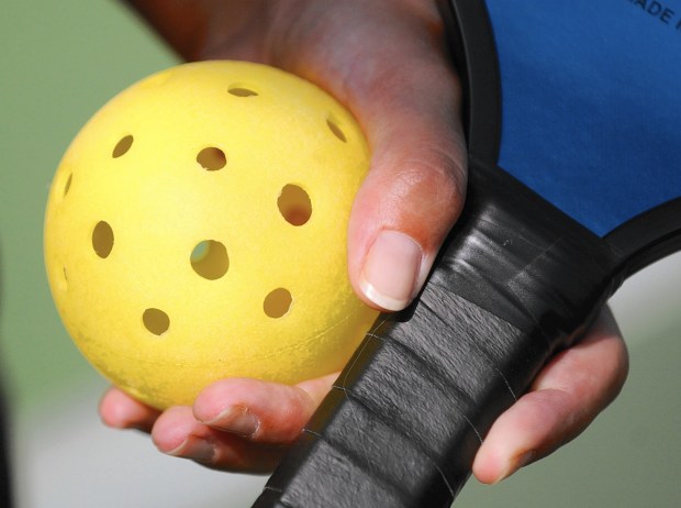 Bud Yoham plays pickleball at The Plantation in Leesburg on Friday, June 16, 2006. (Stephen M. Dowell/Orlando Sentinel)