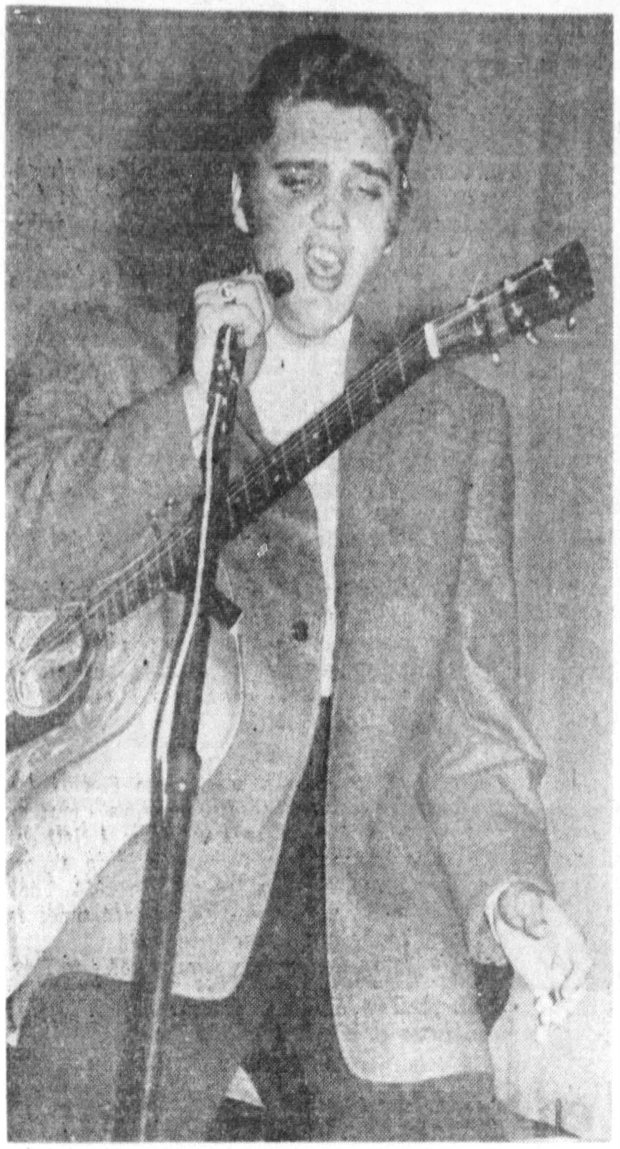 A 21-year-old Elvis Presley preforms one of his two shows at the Orlando Municipal Auditorium on Aug. 8, 1956. (Orlando Sentinel file)