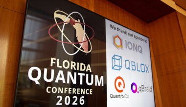 A sign announced the Florida Quantum Conference and its sponsors.