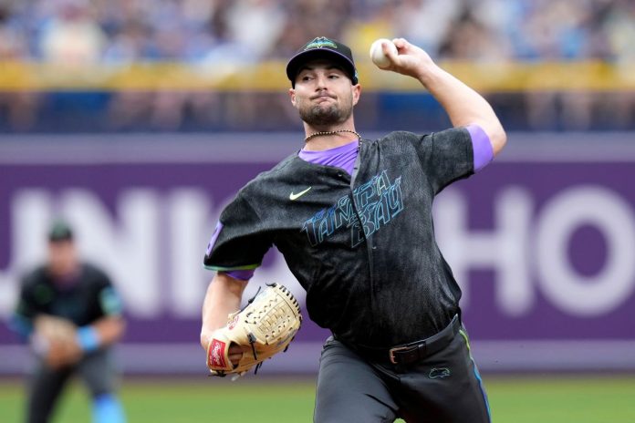 Tampa Bay Rays pitcher Shane McClanahan delivers to the Minnesota Twins during the first inning of a baseball game Saturday, April 25, 2026, in St. Petersburg, Fla. (AP Photo/Chris O'Meara)