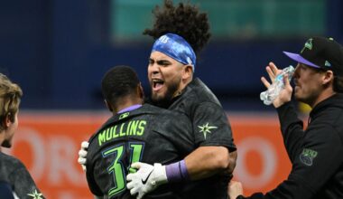 Tampa Bay Rays' Cedric Mullins (31) and Jonathan Aranda celebrate after Aranda's RBI walk-off single during the tenth inning of a baseball game against the New York Yankees Saturday, April 11, 2026, in St. Petersburg, Fla. (AP Photo/Jason Behnken)