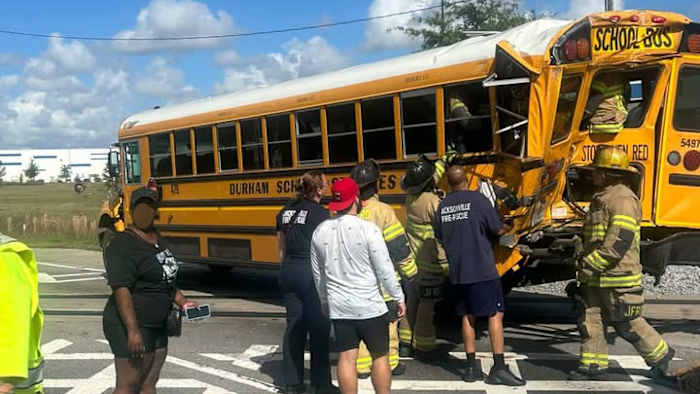 Semi driver cited for careless driving, fined $164 in school bus crash that injured 4 kindergartners, records show