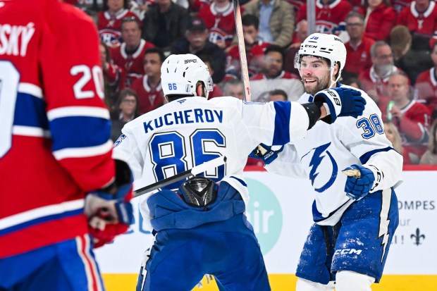 Brandon Hagel (38) of the Tampa Bay Lightning celebrates his goal with teammate Nikita Kucherov (86) during the third period against the Montréal Canadiens in Game 4 of the first round of the 2026 Stanley Cup Playoffs at the Bell Centre on Sunday, April 26, 2026, in Montreal. The Tampa Bay Lightning defeated the Montréal Canadiens 3-2.  (Minas Panagiotakis/Getty Images/TNS)