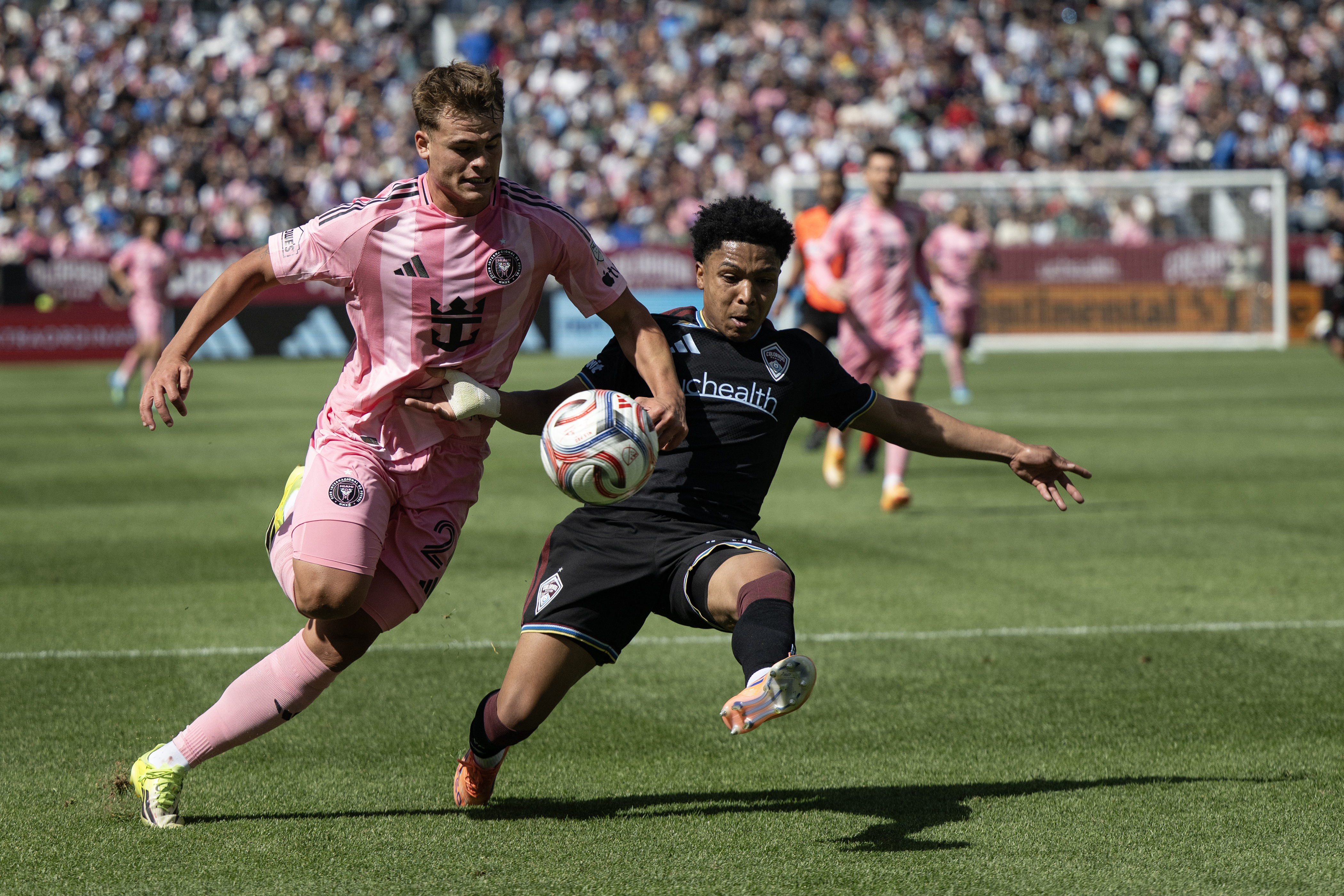 Defender Jackson Travis (99) of the Colorado Rapids boots it...