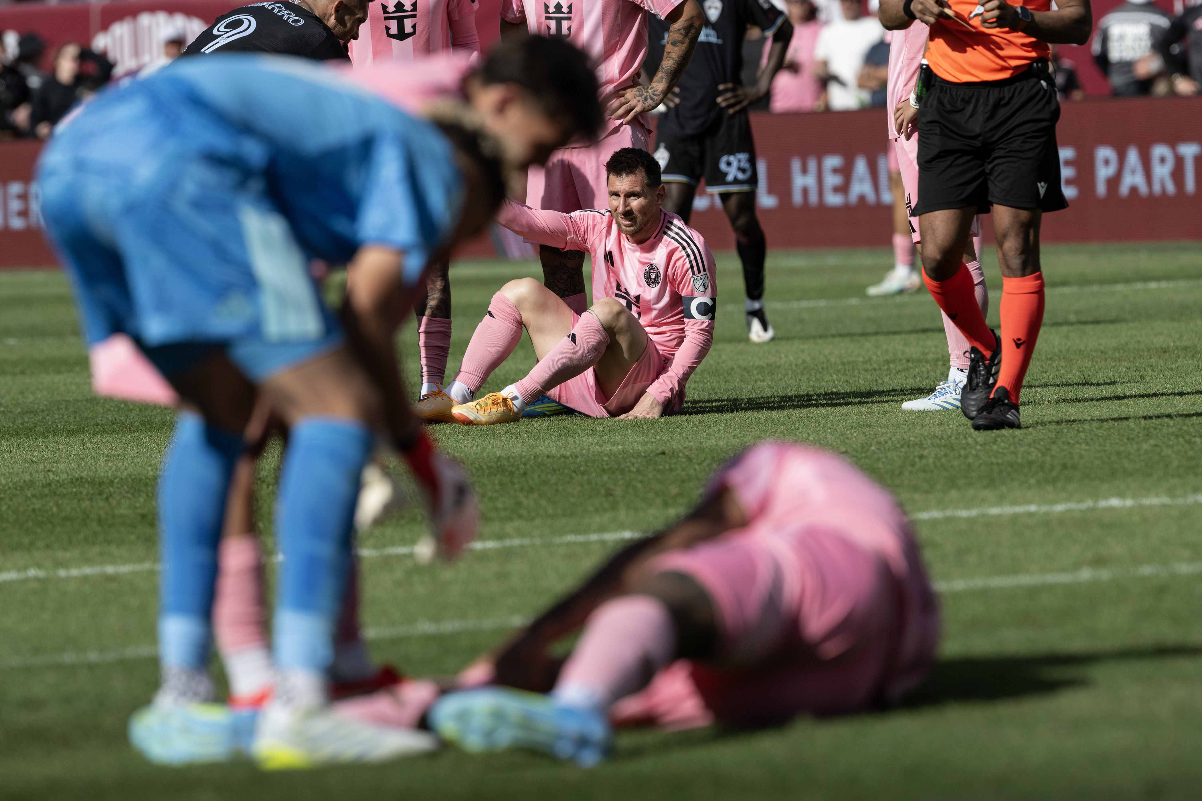 Forward Rafael Navarro (9) of the Colorado Rapids helps up...