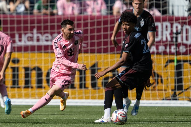 Forward Lionel Messi (10) of the Inter Miami CF steals the ball from defender Lucas Herrington (22) of the Colorado Rapids on Saturday, April 18, 2026, at Empower Field at Mile High in Denver. (Photo by Timothy Hurst/The Denver Post)