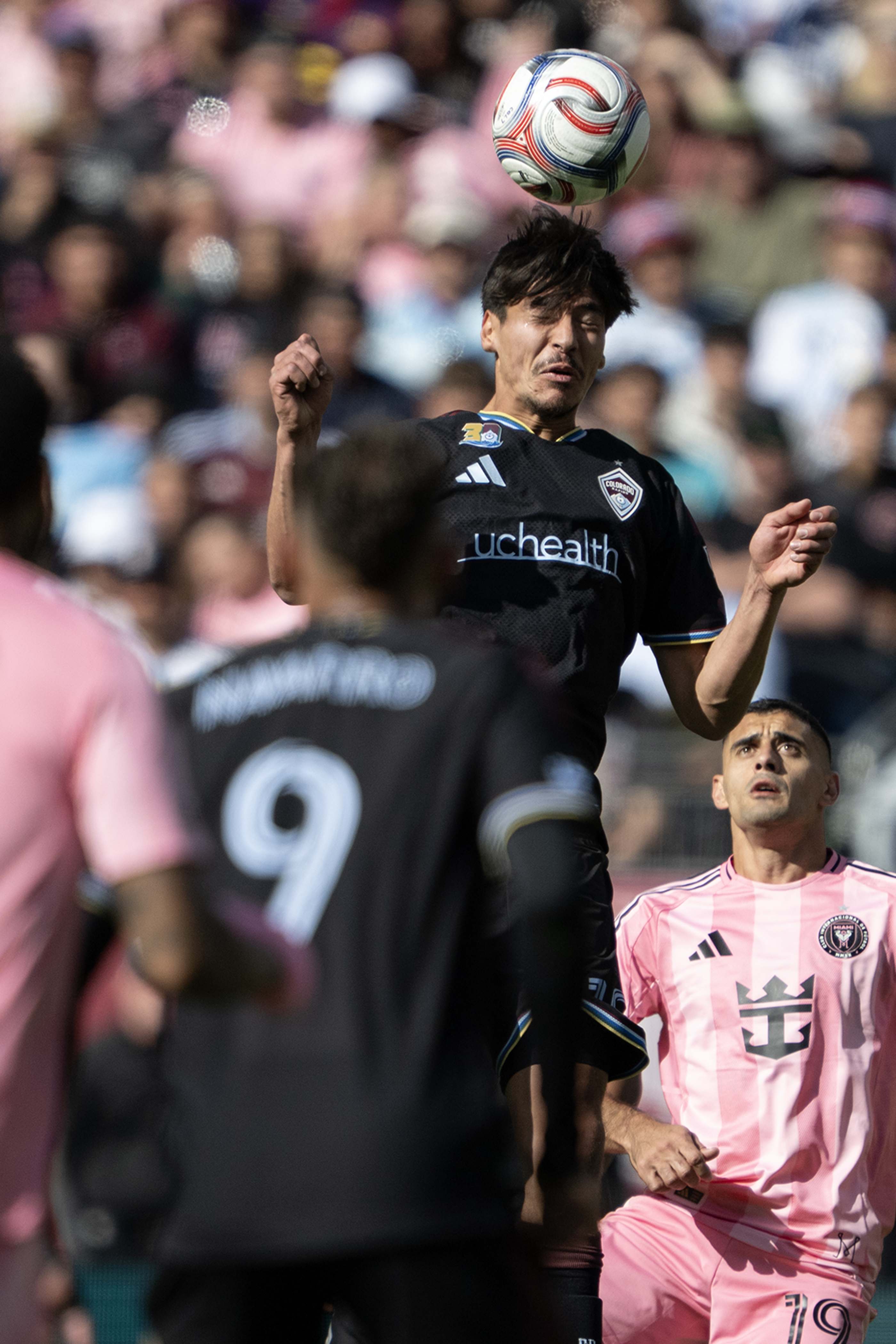 Midfielder Josh Atencio (12) of the Colorado Rapids goes up...