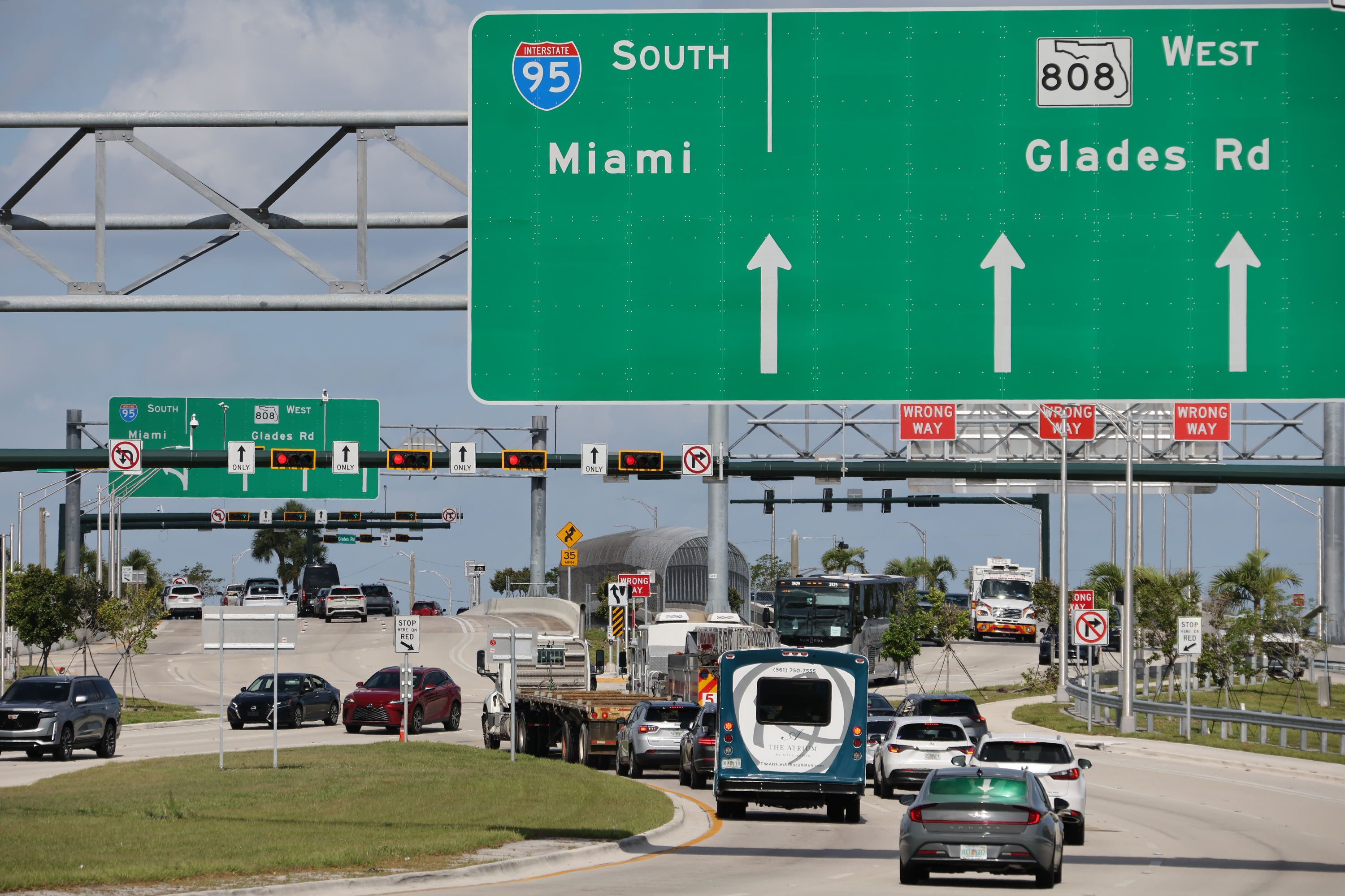 Vehicles navigate the I-95 and Glades Road diverging diamond interchange...
