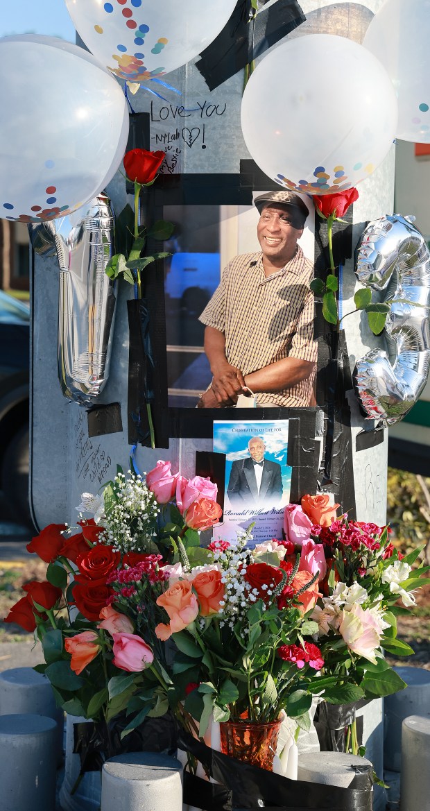 A makeshift memorial for Ronald Wilson is seen at the intersection of Prospect Road and Northwest 31st Avenue in Tamarac on Monday, March 23, 2026. Wilson was killed Feb. 16, 2026, during a pursuit after a Broward Sheriff's Office deputy crashed into Wilson's truck, a probable cause affidavit said. (Carline Jean/South Florida Sun Sentinel)