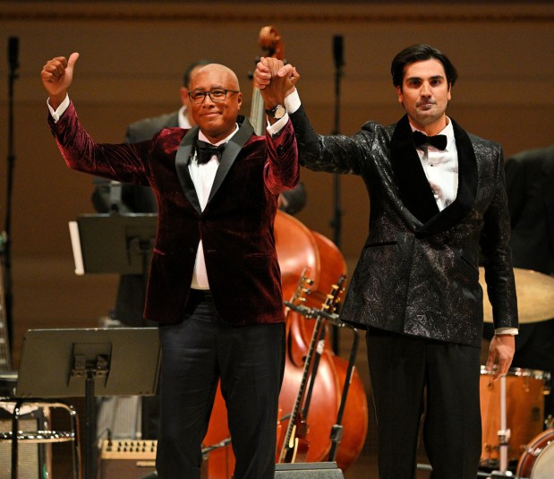 Jazz guitarist and former New York Yankees star Bernie Williams, left, made his Carnegie Hall debut with opera star Jonathan Tetelman on Jan. 13, 2026. The duo will bring their collaboration to the Florida Grand Opera stage at the Arsht Center for the Performing Arts in Miami on May 6. (Bill Menzel/Courtesy)
