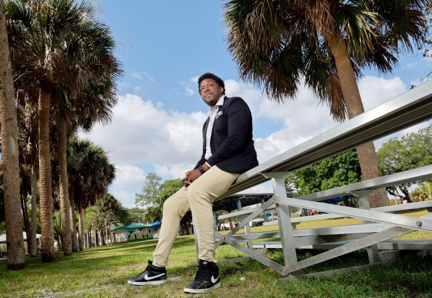 Darius Daughtry, founder of Our Voices: Festival of Words, is shown at Delevoe Park on Friday, April 18, 2025. The festival will take place at the park and the adjacent African-American Research Library on April 24-26. (Amy Beth Bennett / South Florida Sun Sentinel)