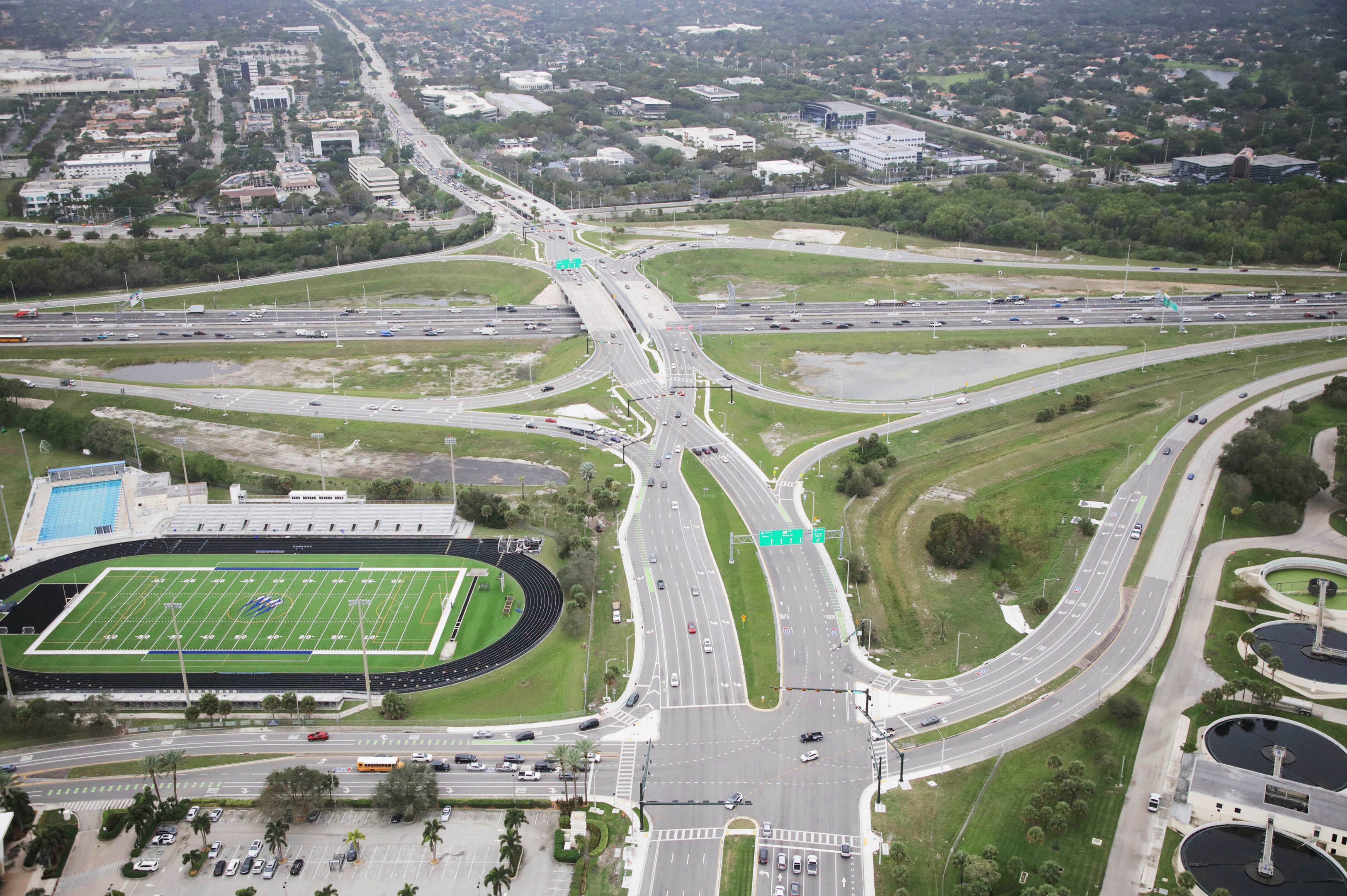 An aerial photo shows the diverging diamond interchange at Glades...