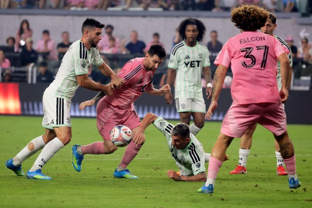 Inter Miami CF forward Lionel Messi (10) goes up against Austin FC during the inaugural game at the Inter Miami Nu Stadium on Saturday April 4, 2026. (Mike Stocker/South Florida Sun Sentinel)