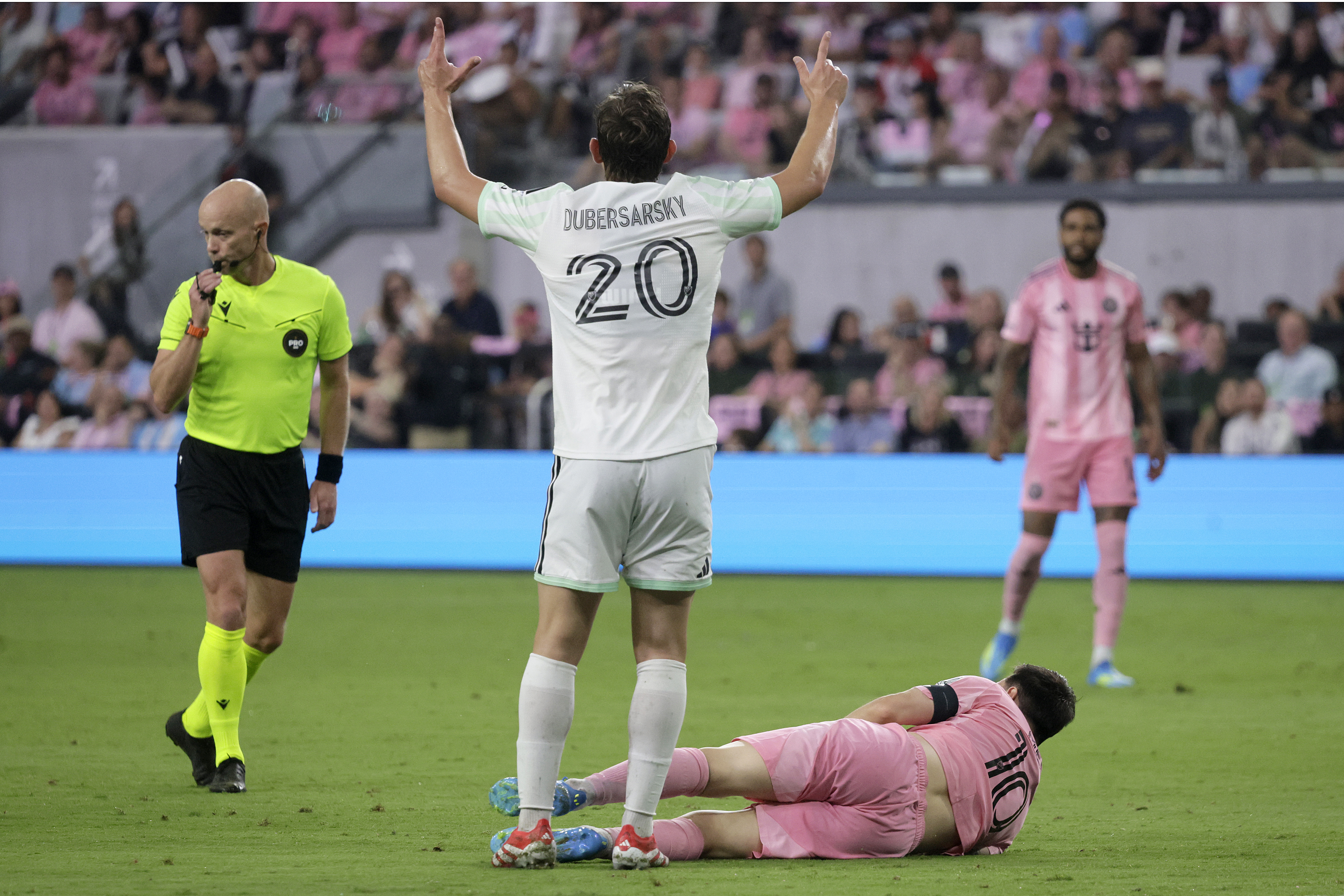 Inter Miami CF forward Lionel Messi (10) lays on the...