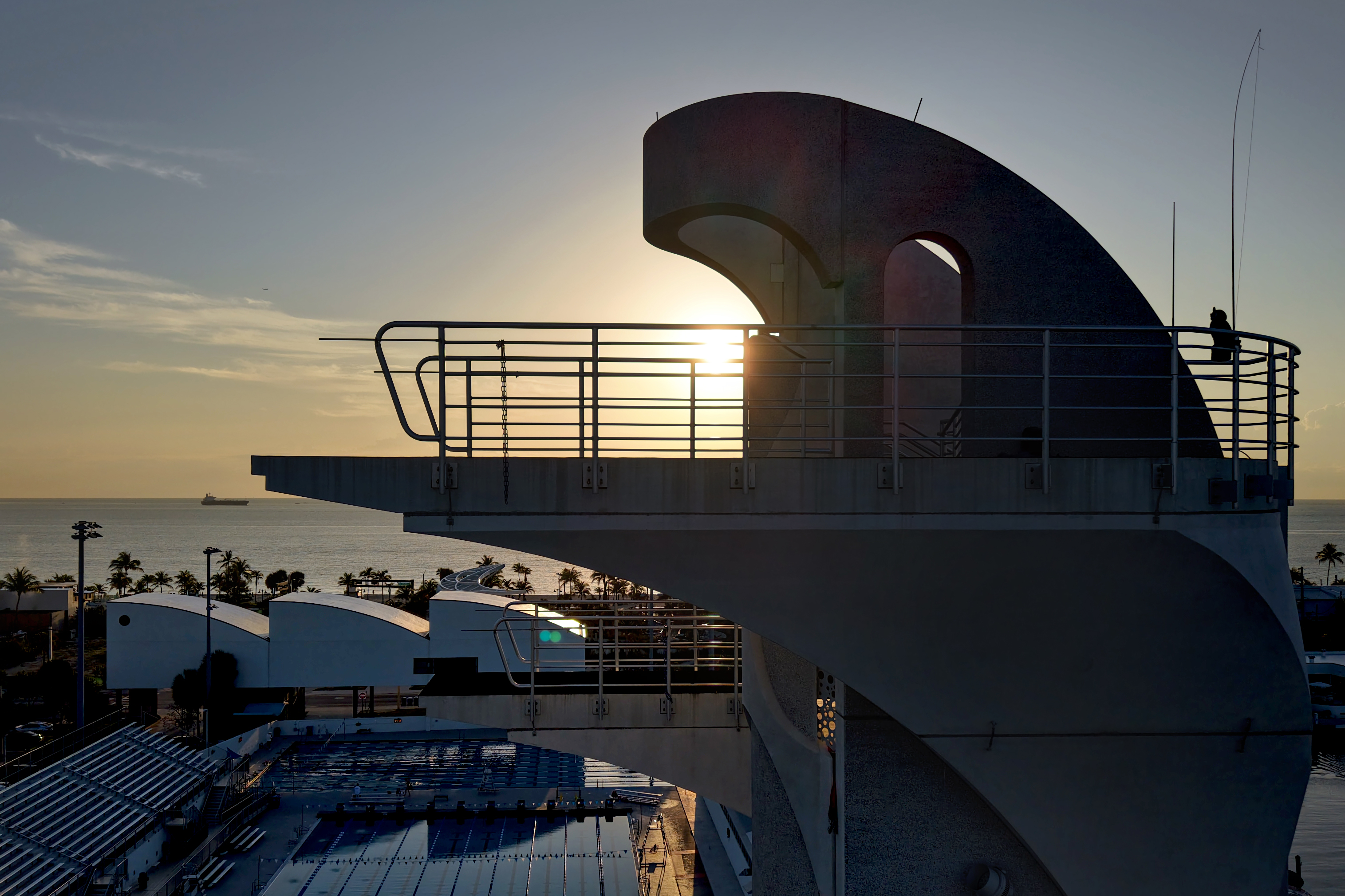 The dive tower, shown Friday, towers over the original International Swimming Hall of Fame building to the east. That building will be torn down to make way for a taller building. (Amy Beth Bennett/South Florida Sun Sentinel)