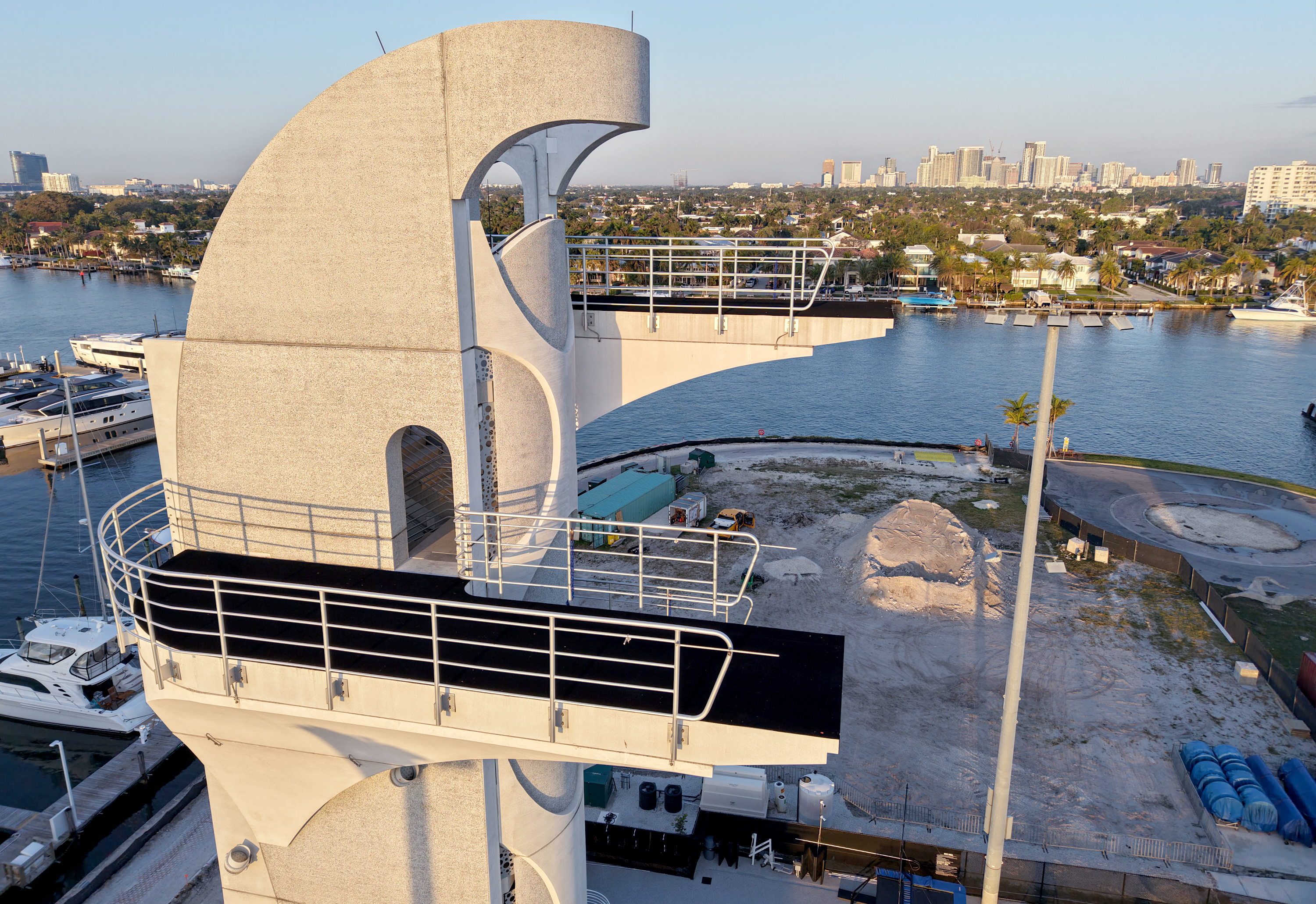 The top of the 27-meter dive tower is shown adjacent...