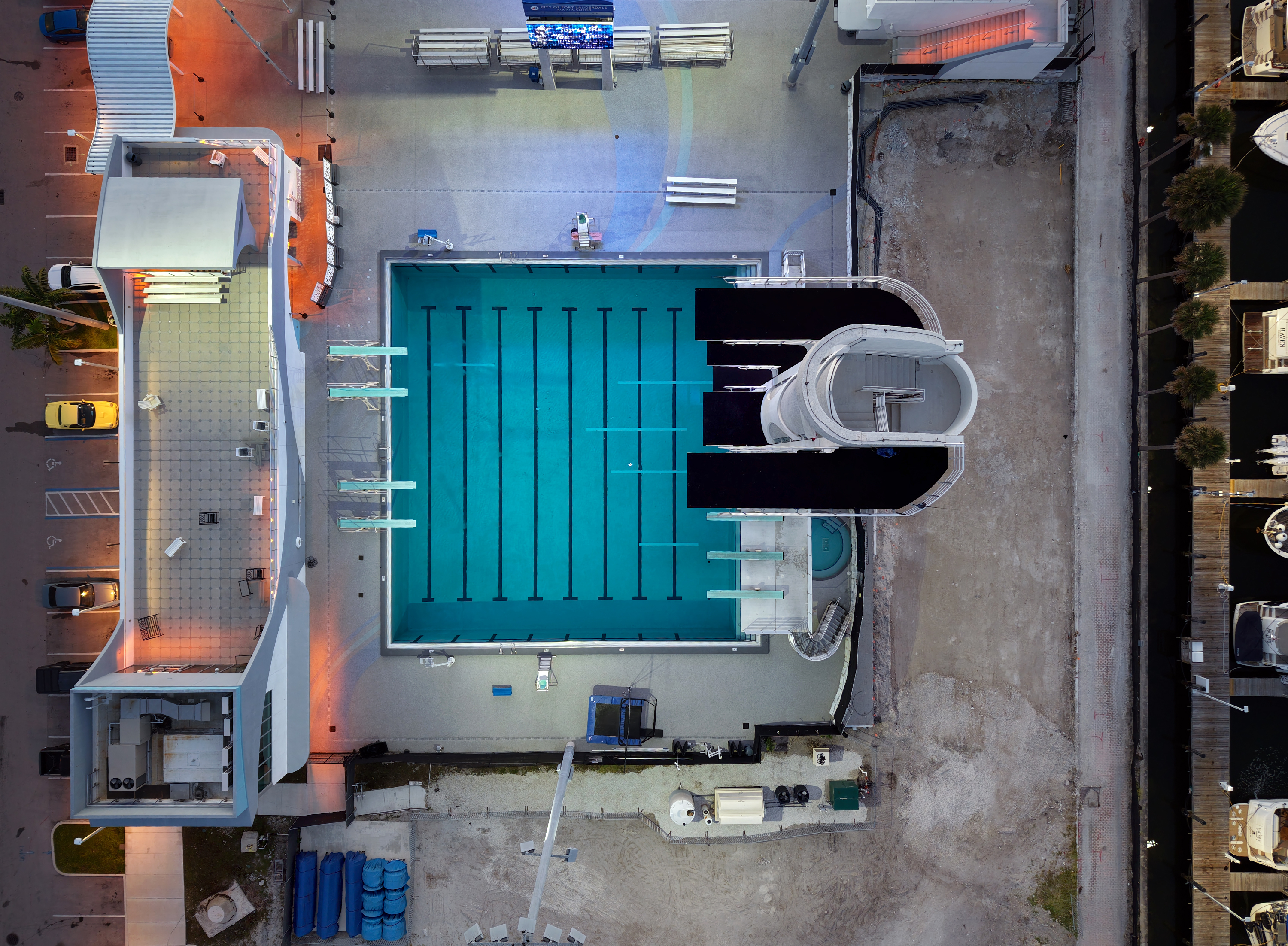 The top of the 27-meter dive tower is shown adjacent...