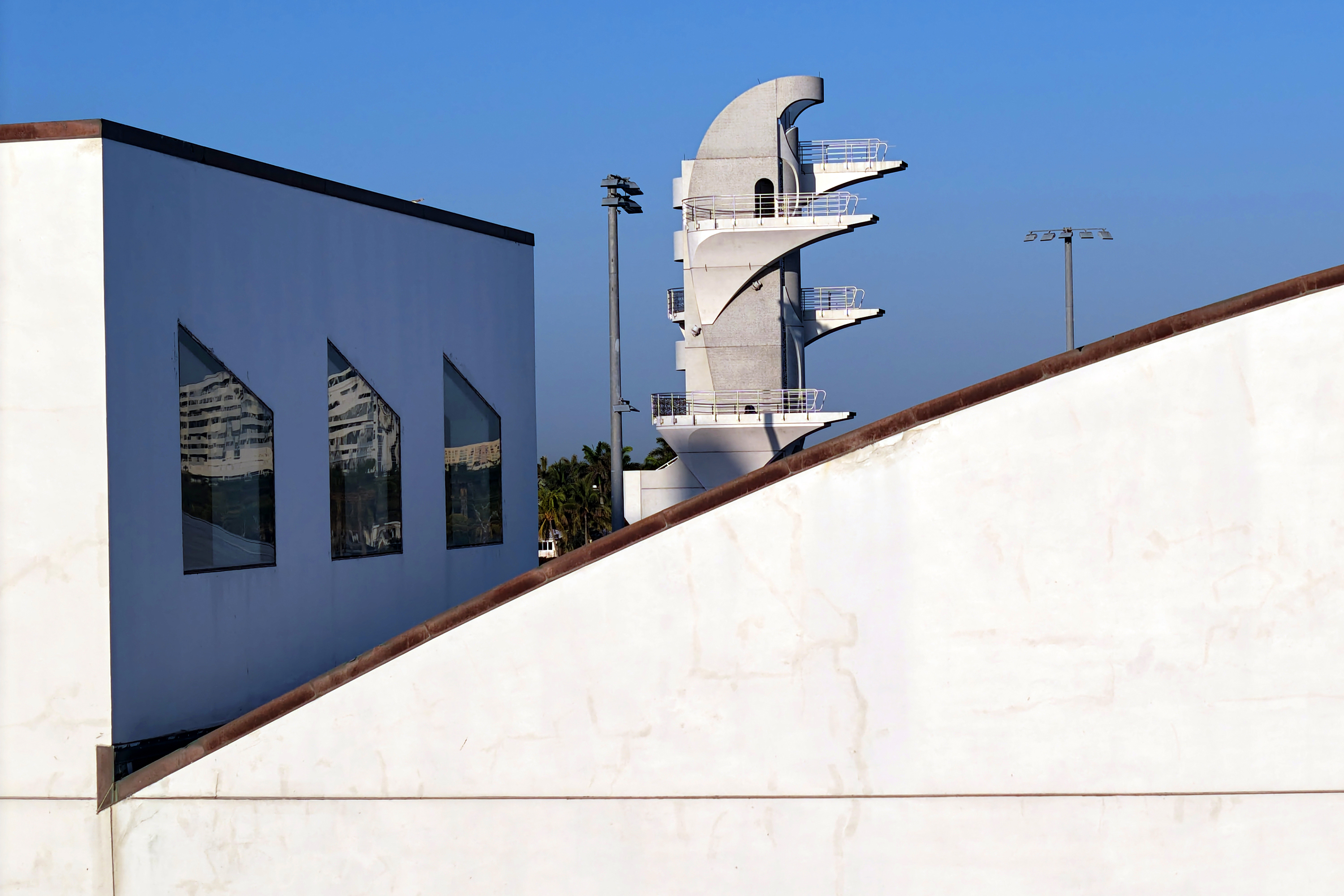 The 27-meter dive tower peeks out above the current International...