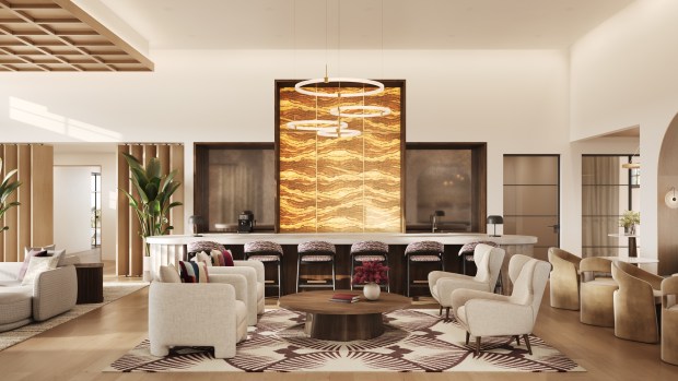 The interior of the clubhouse for residents of The Regency includes social and gathering spaces, a state-of-the-art fitness center and much more. The clubhouse has an 80-inch TV along with a state-of-the-art Bose sound system and fitness center. The onyx wall at center is backlit. (Rendering from FK Architects/Selnik Development)