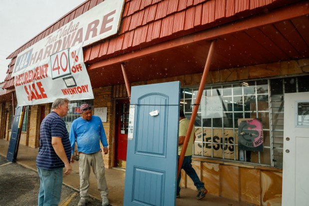 Bob Schmidt helps a customer at J&L Hardware in Orlando on Thursday, April 8, 2027. Owners Larry and Belinda Finley are retiring and closing their shop, which has been in operation on Orange Blossom Trail since the 1970s. (Rich Pope/Orlando Sentinel)