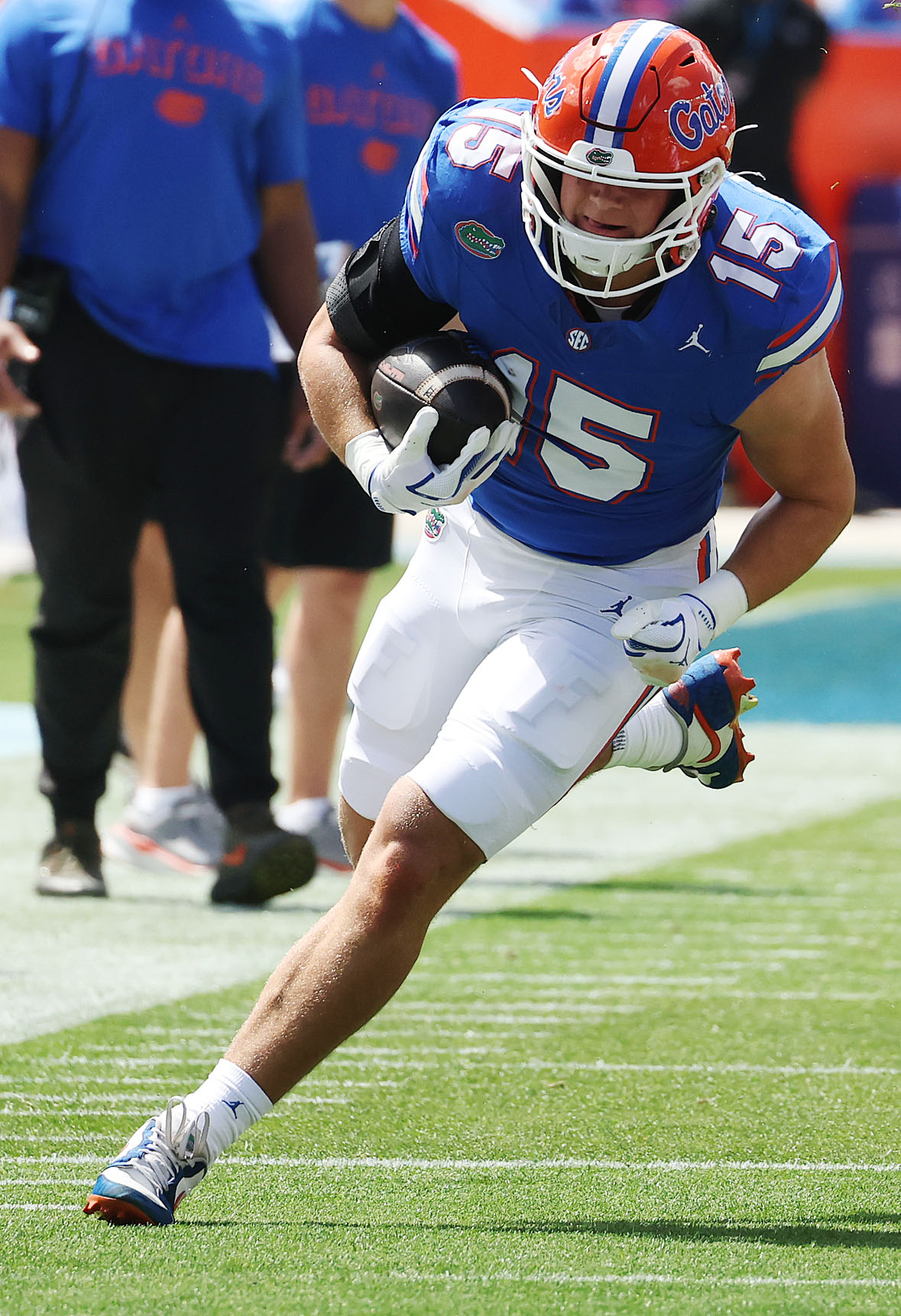 University of Florida tight end Luke Harpring runs after a...