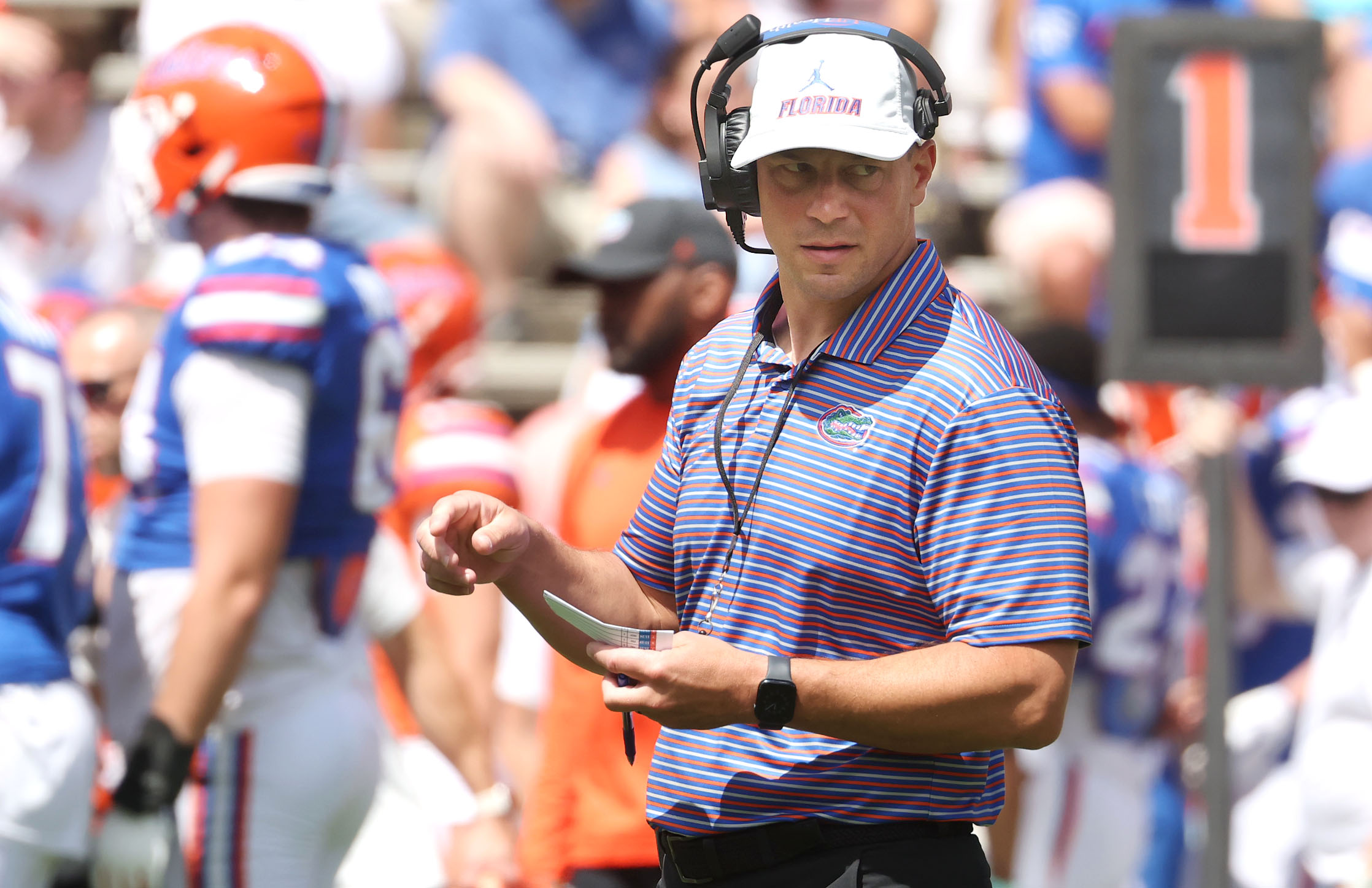 University of Florida head coach Jon Sumrall coaches during the...