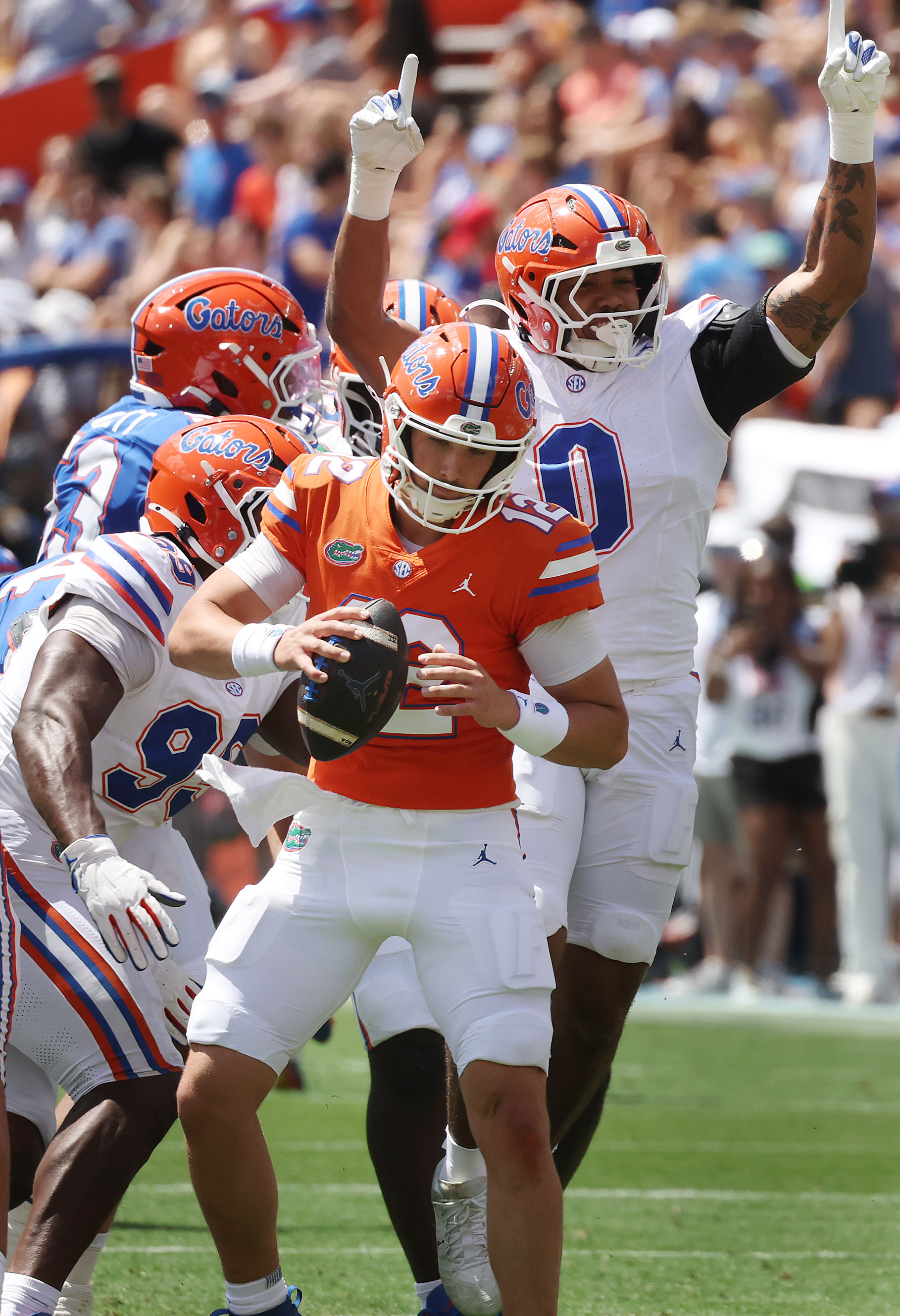 University of Florida quarterback Aaron Philo (12) is sacked by...