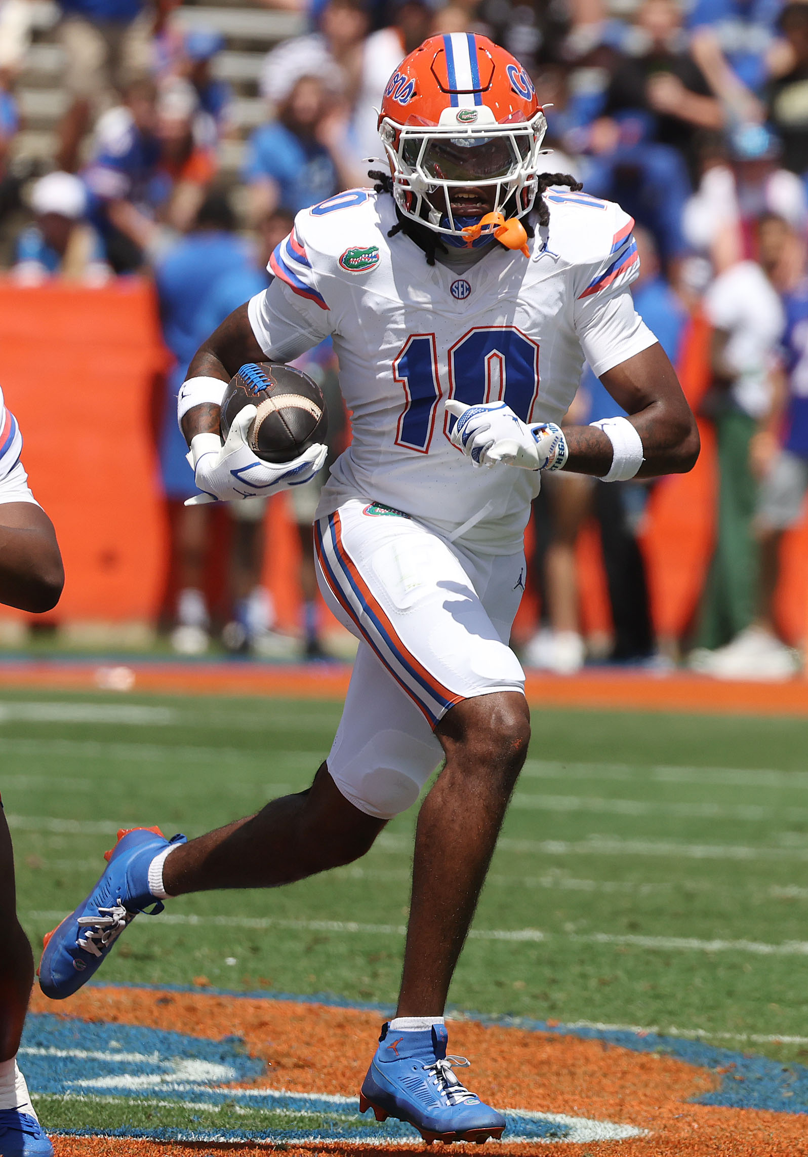 University of Florida safety Cam Dooley runs after an interception...