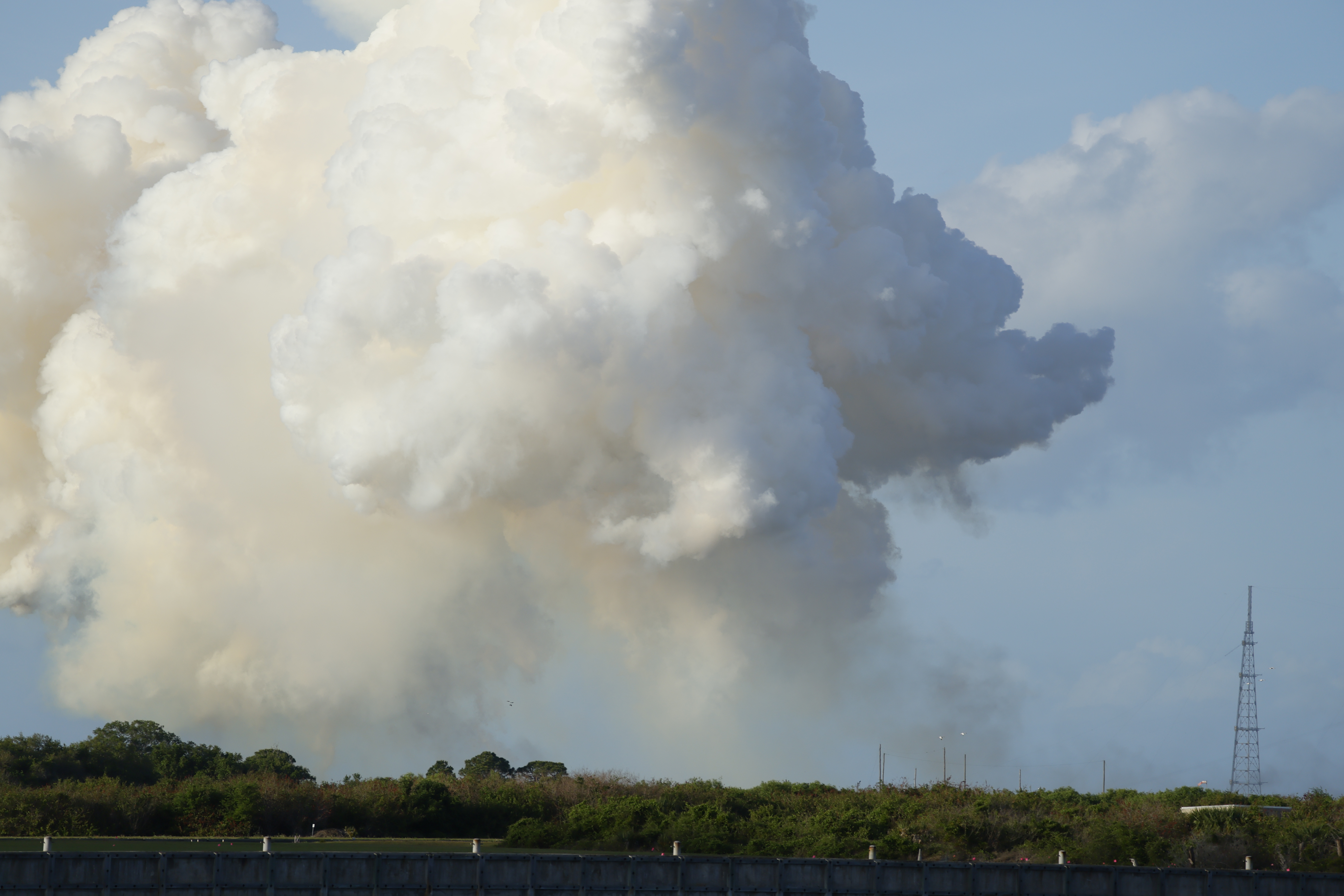 A massive plume is seen after the Space Launch System...