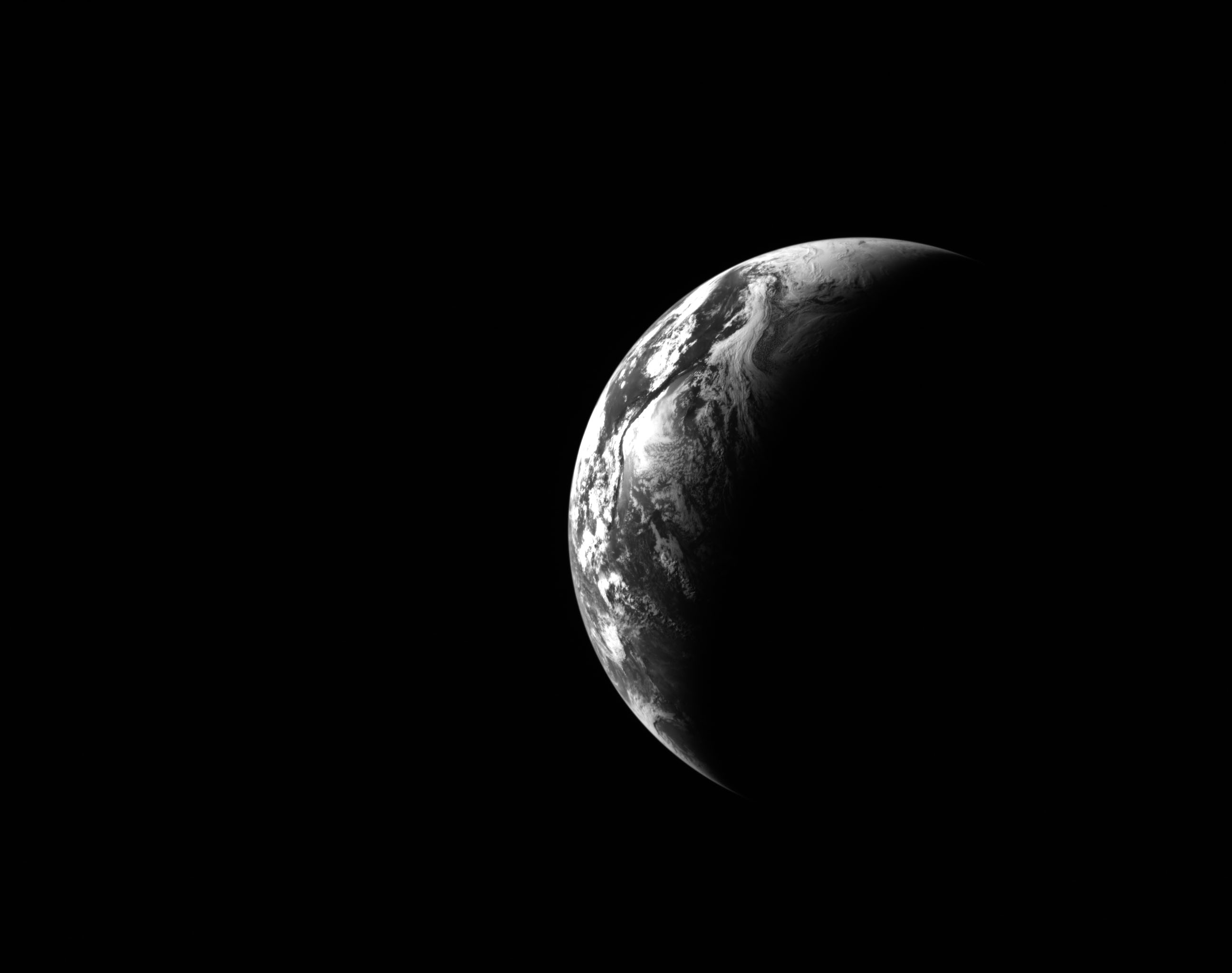This black and white image of Earth was captured by...