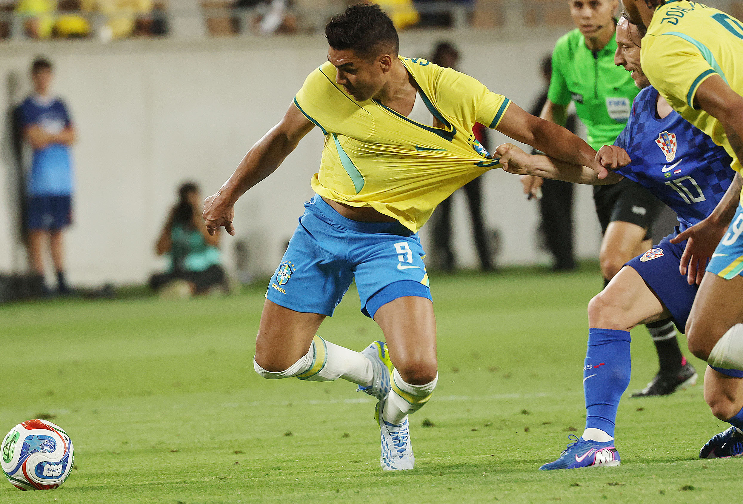 Brazil player Joao Pedro (9) and Croatia player Luka Modric...