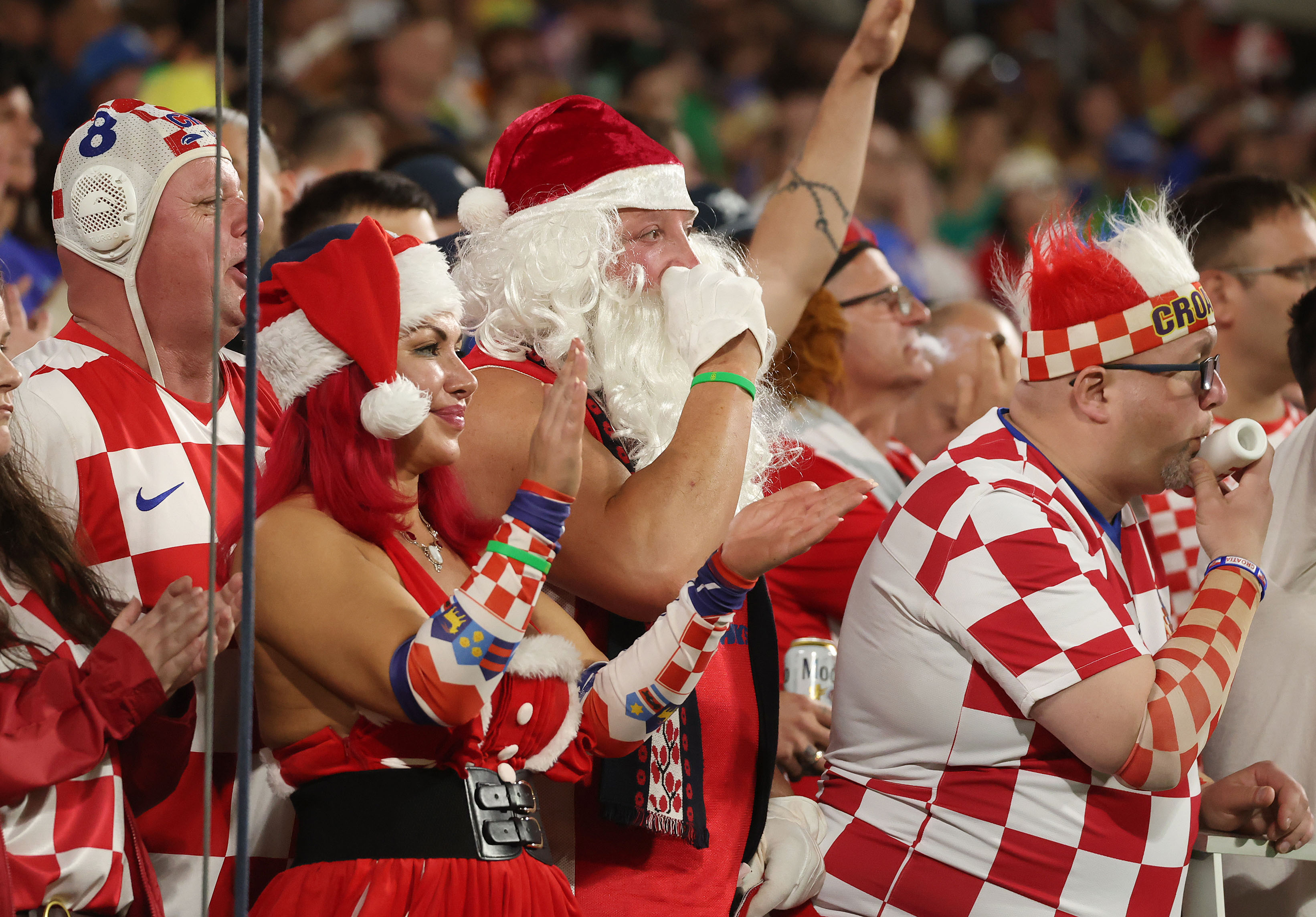 Croatia fans cheer during the Brazil vs. Croatia Road to...