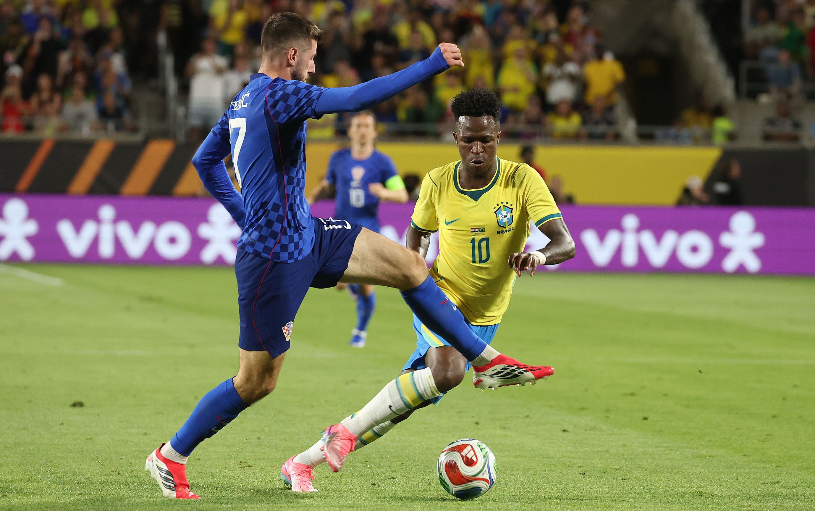Croatia player Petar Sucic (17) and Brazil player Luka Modric...