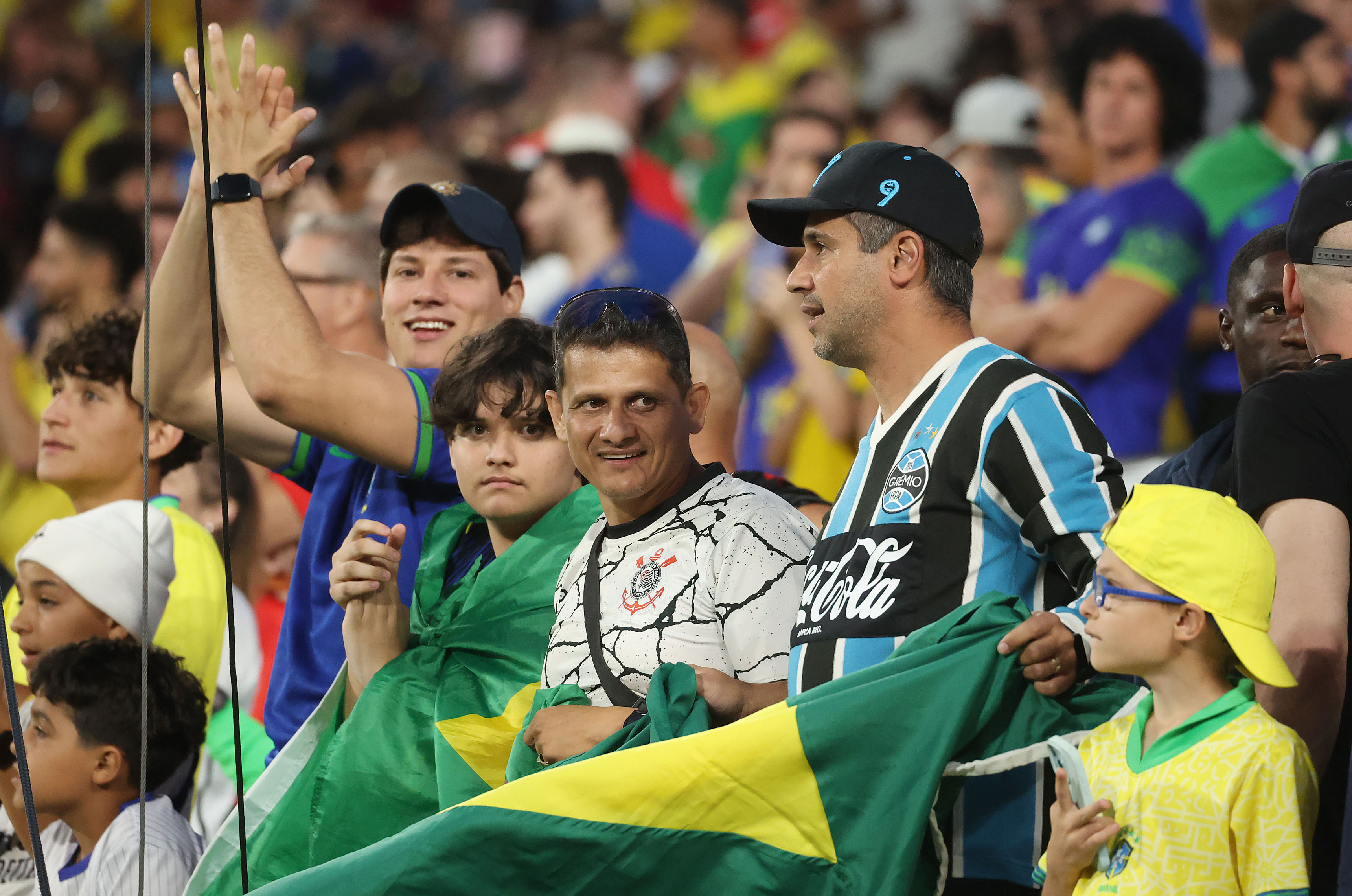 Brazil fans cheer during the Brazil vs. Croatia Road to...