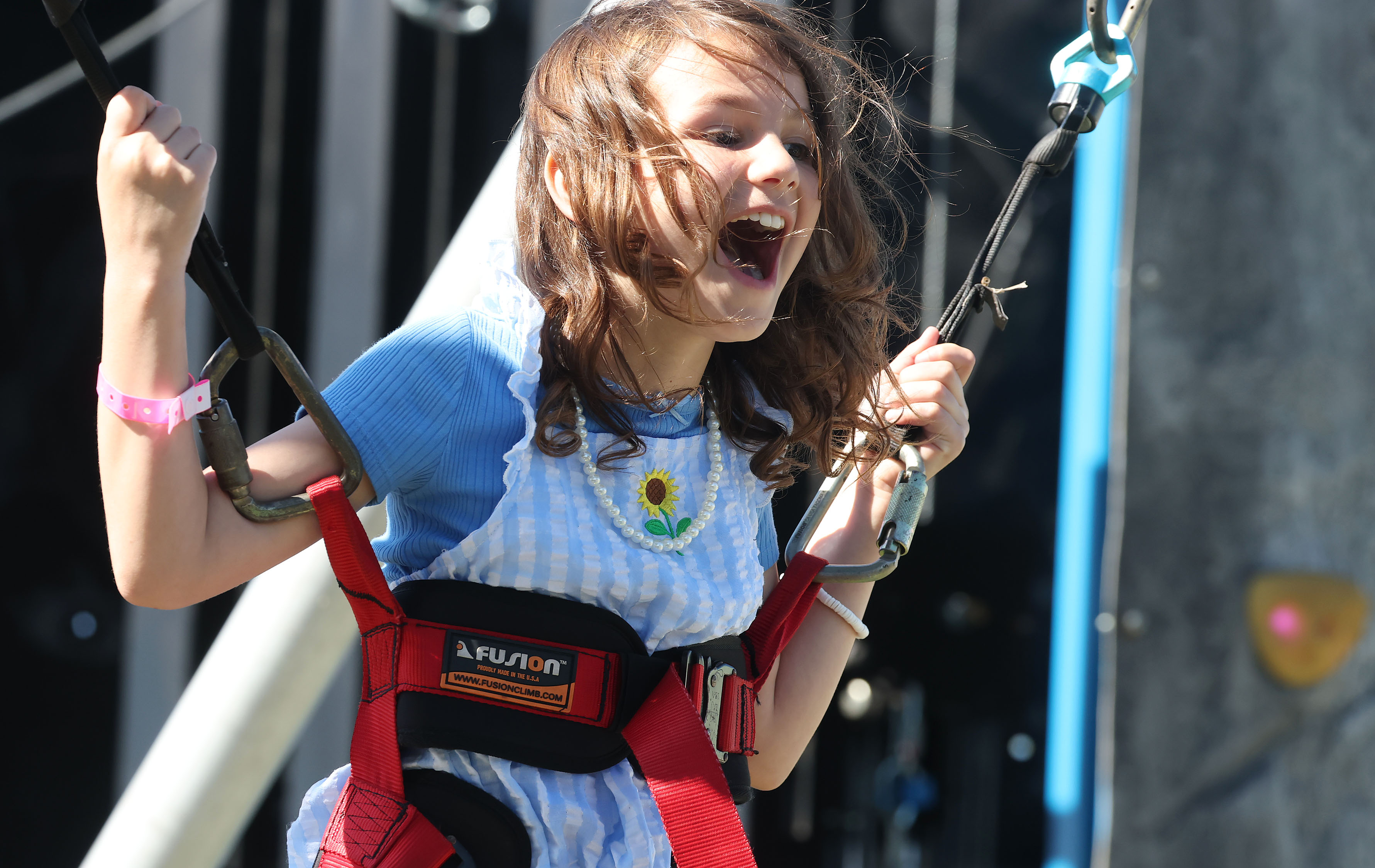 A girl enjoys a ride during the Easter Eggstravaganza at...