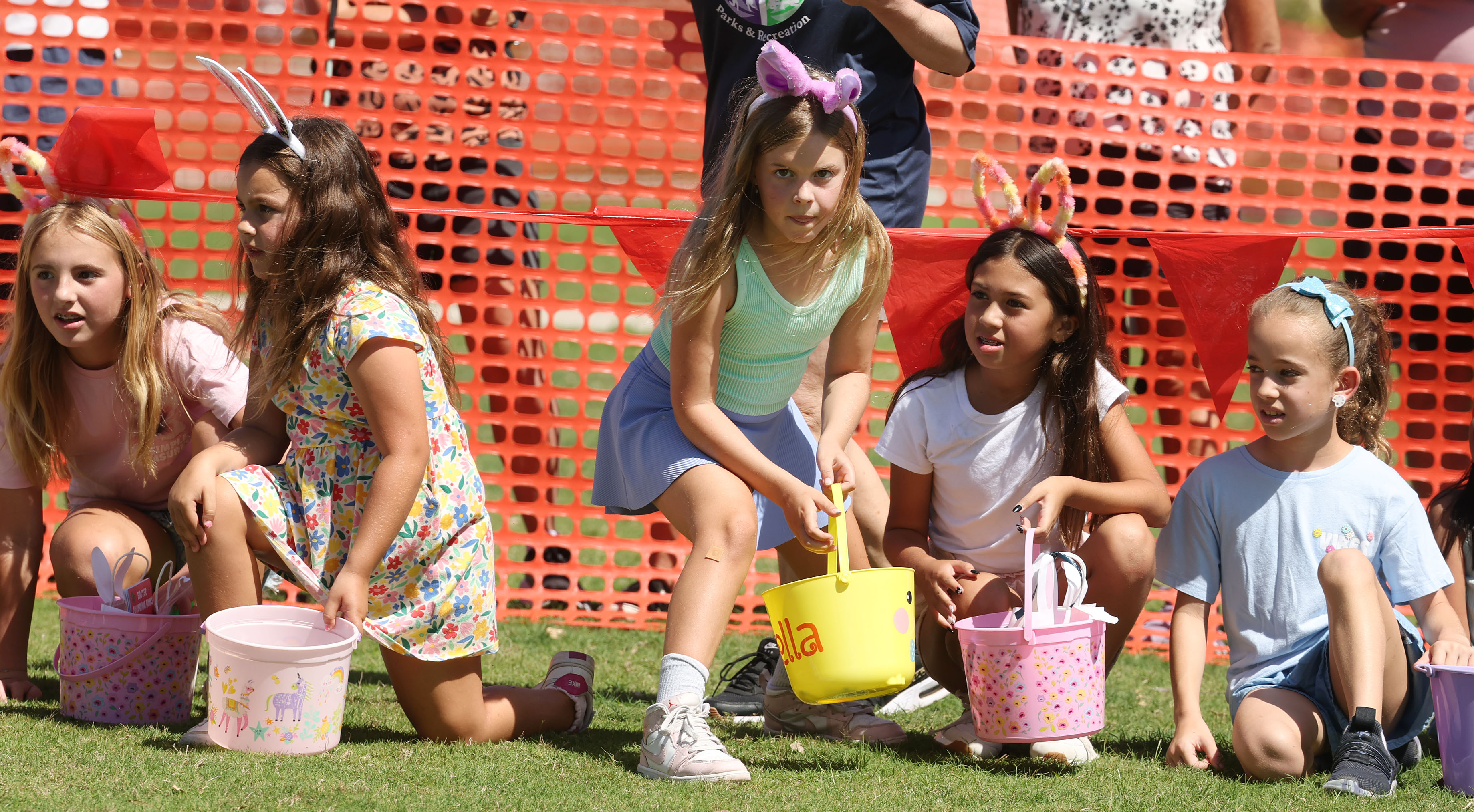 A girl at center takes a determined stance as she...
