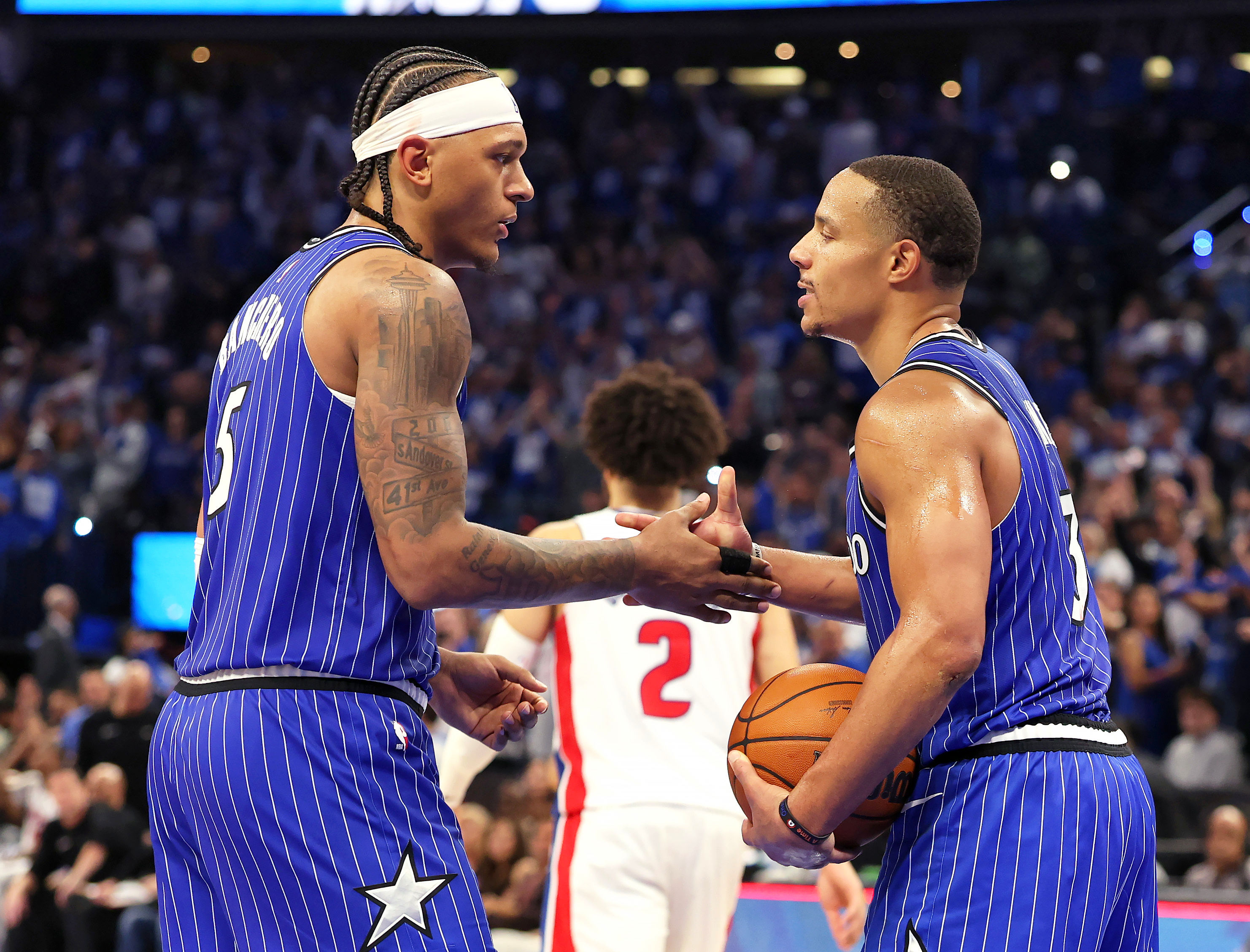 Orlando Magicâs Paolo Banchero and Desmond Bane celebrate after winning...