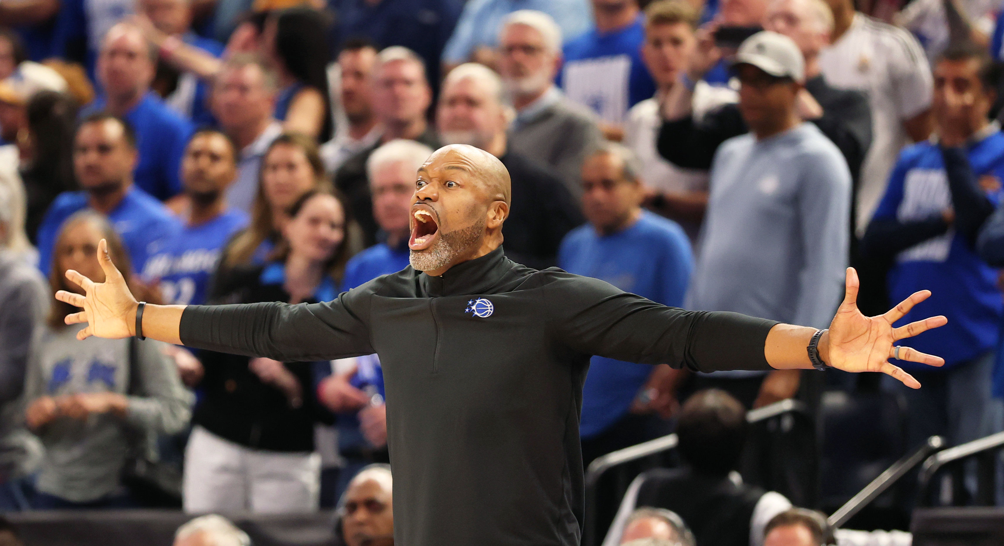 Orlando Magic head coach Jamahl Mosley objects to a call...