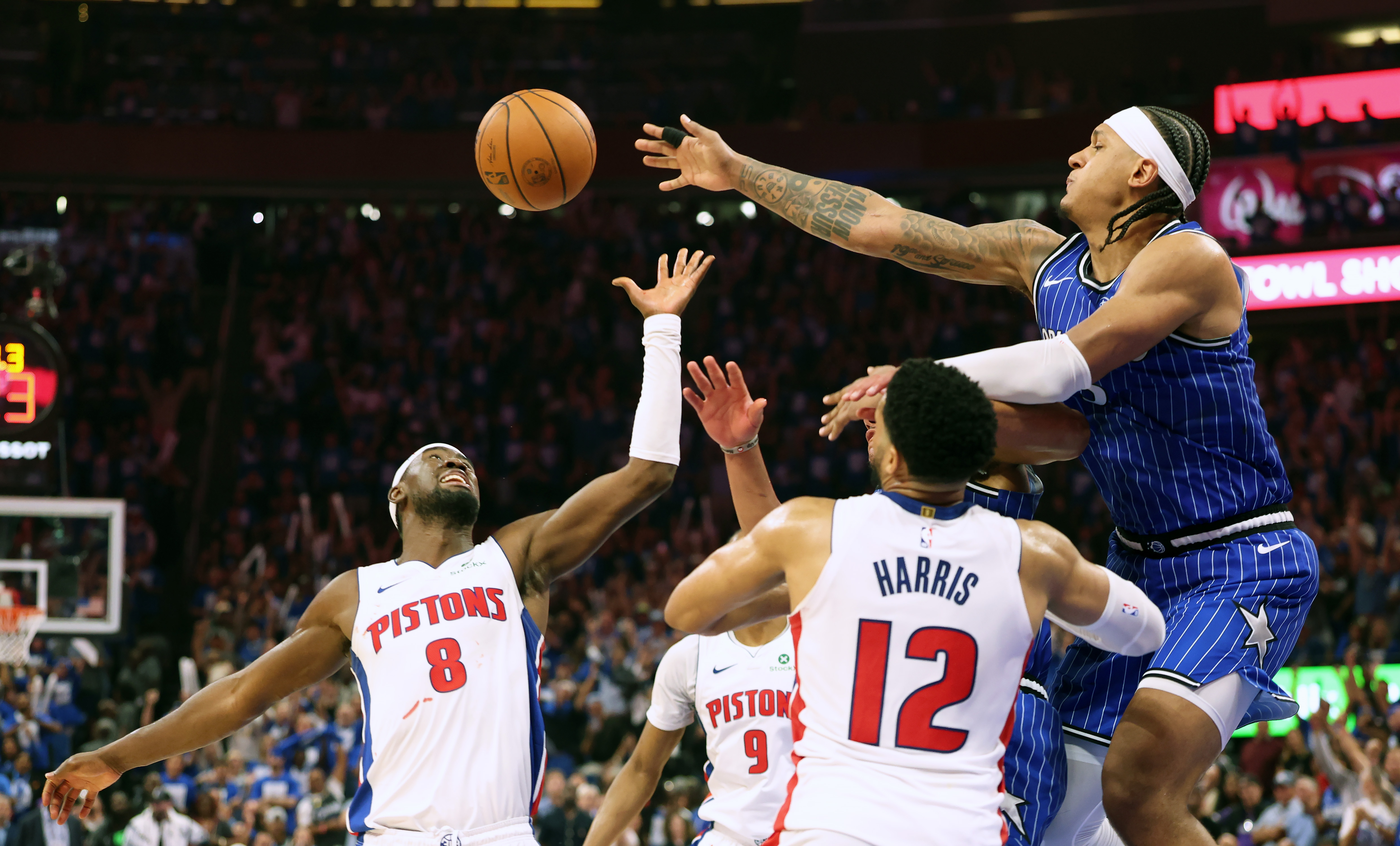 Orlando Magic forward Paolo Banchero (#5) gets airborne over Detroit...