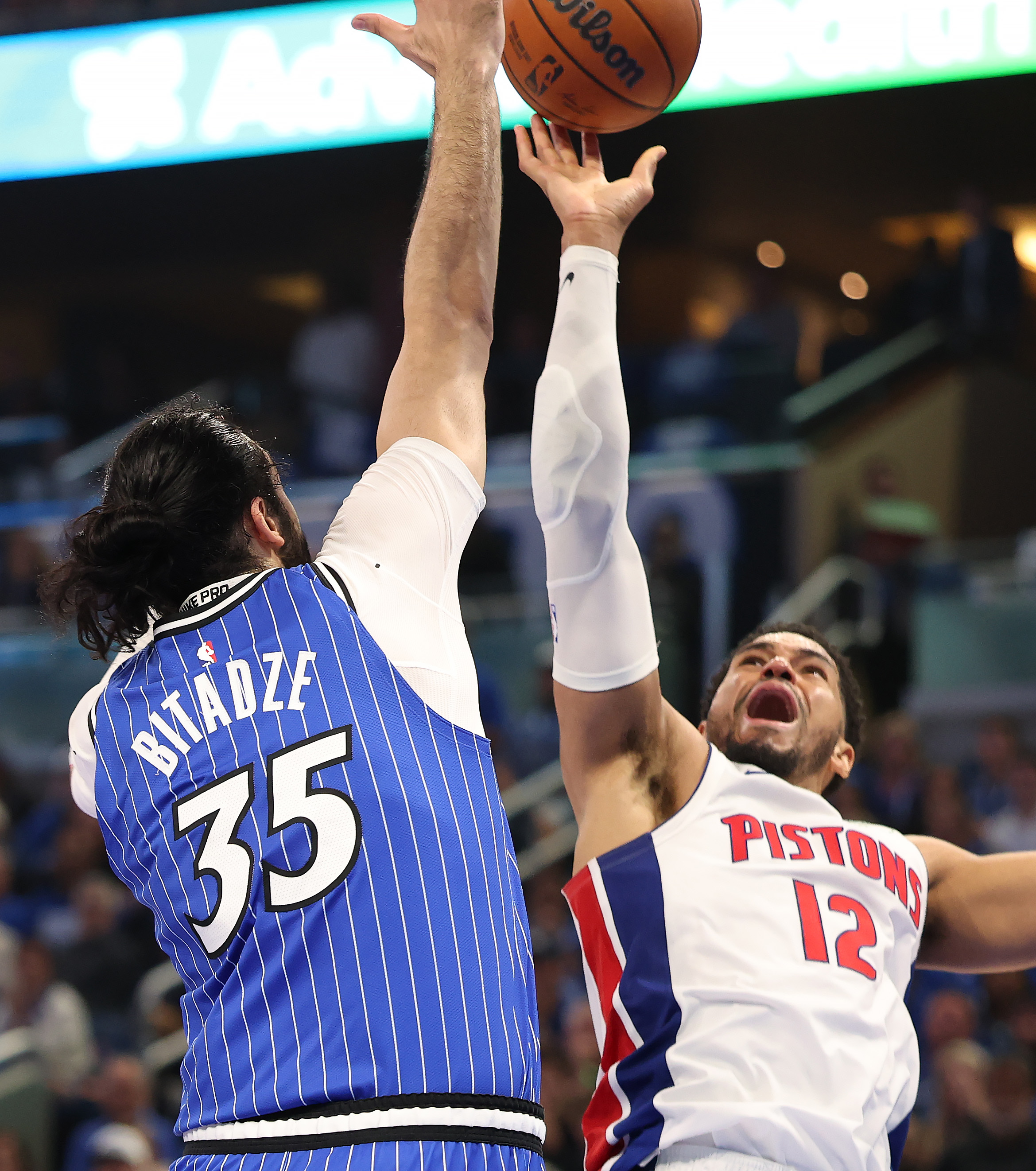 Orlando Magicâs Goga Bitadze and Detroit Pistonsâ Tobias Harris battle...