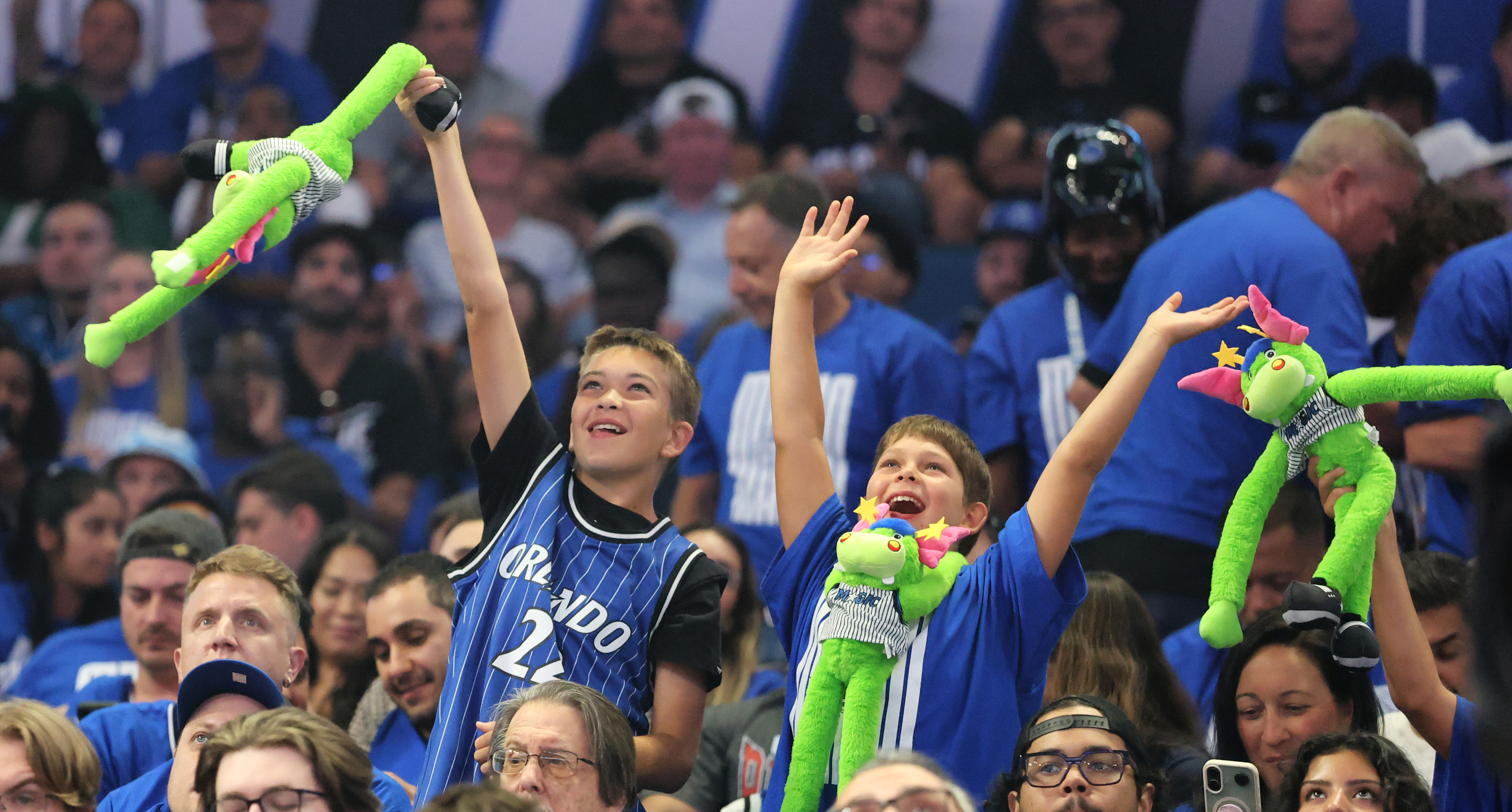 Young Orlando Magic fans cheer during Game 4 of the...