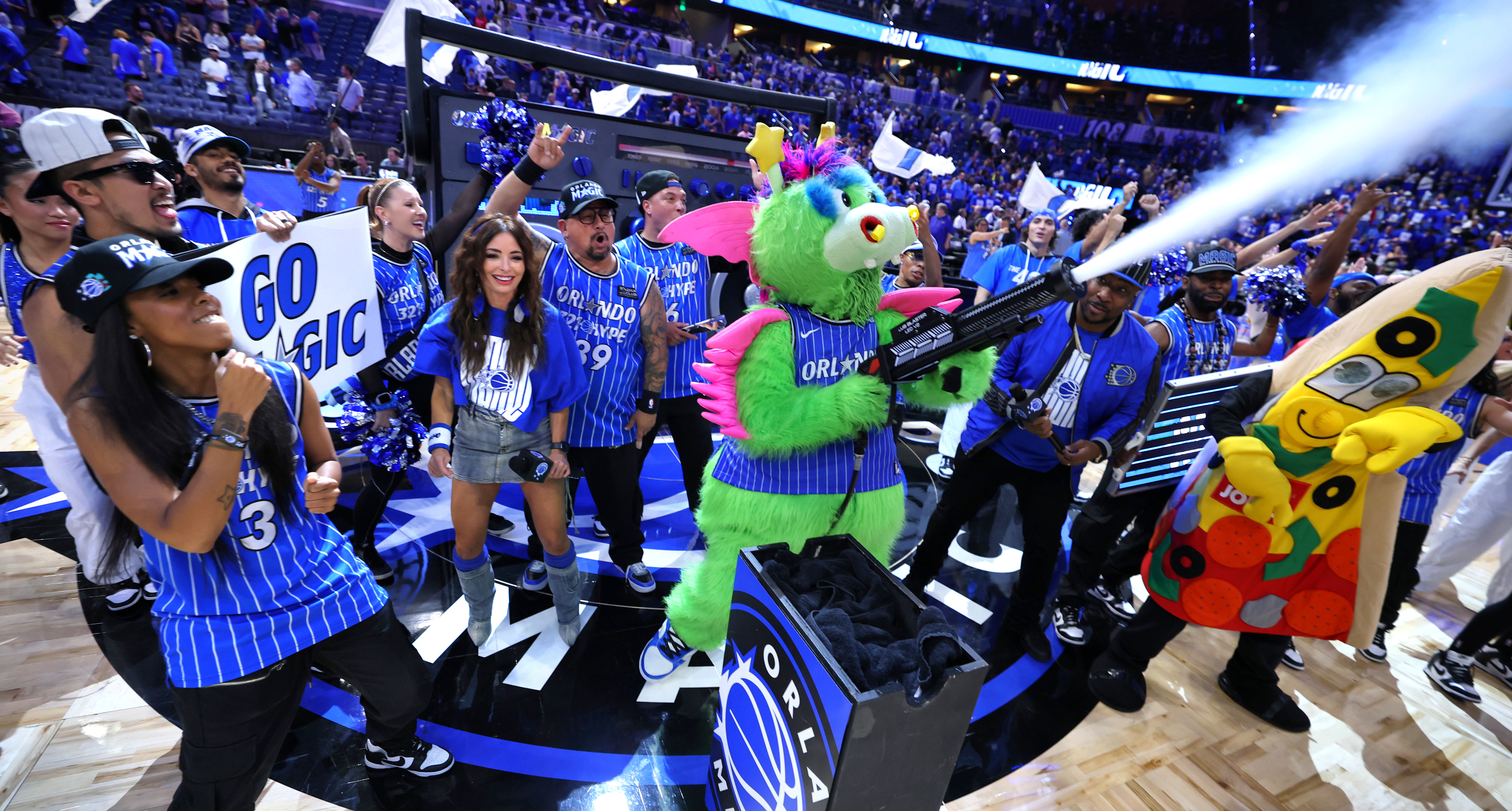 Orlando Magicâ mascot Stuff celebrates the win with The 407...
