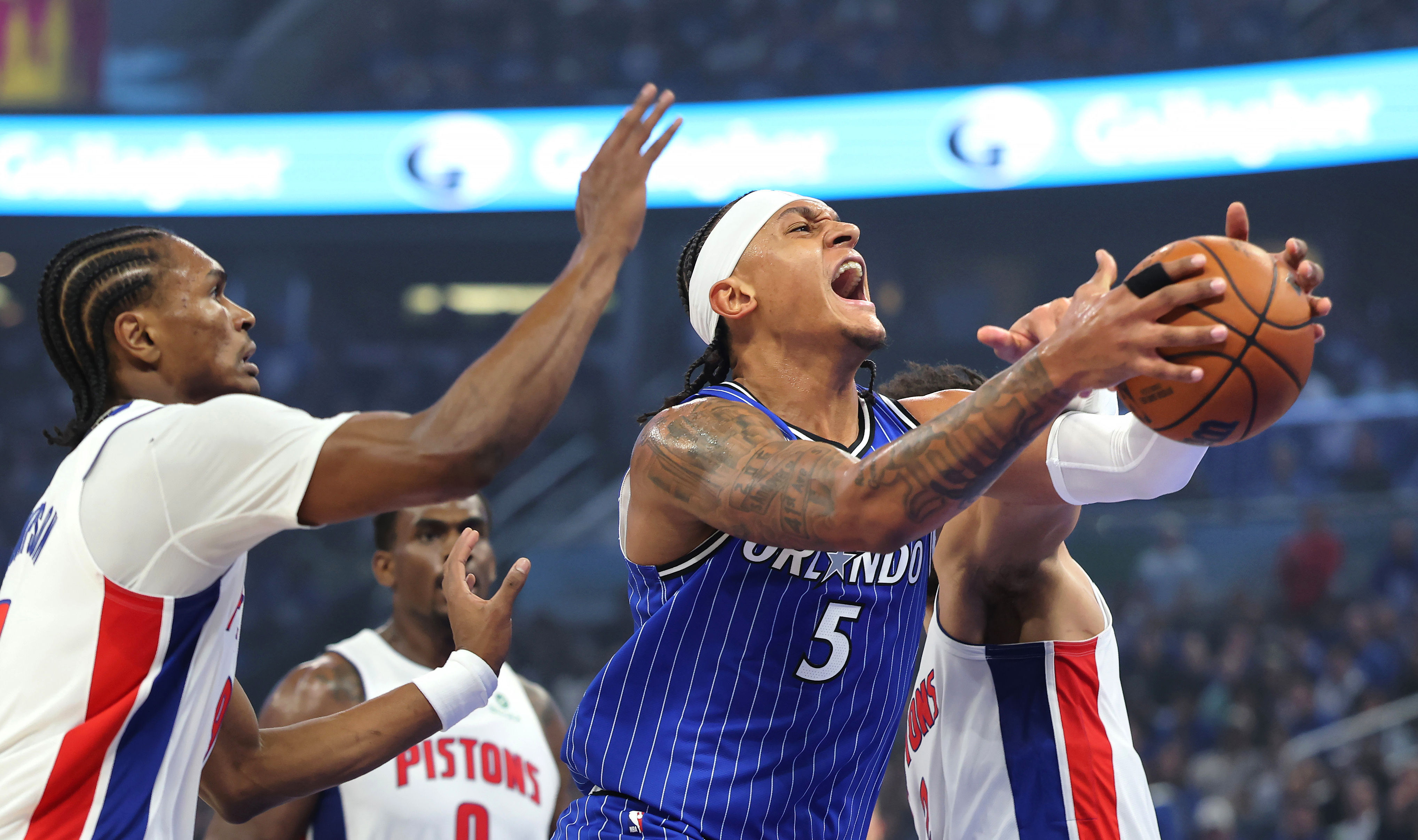 The Orlando Magic foward Paolo Banchero (#5) drives to the...