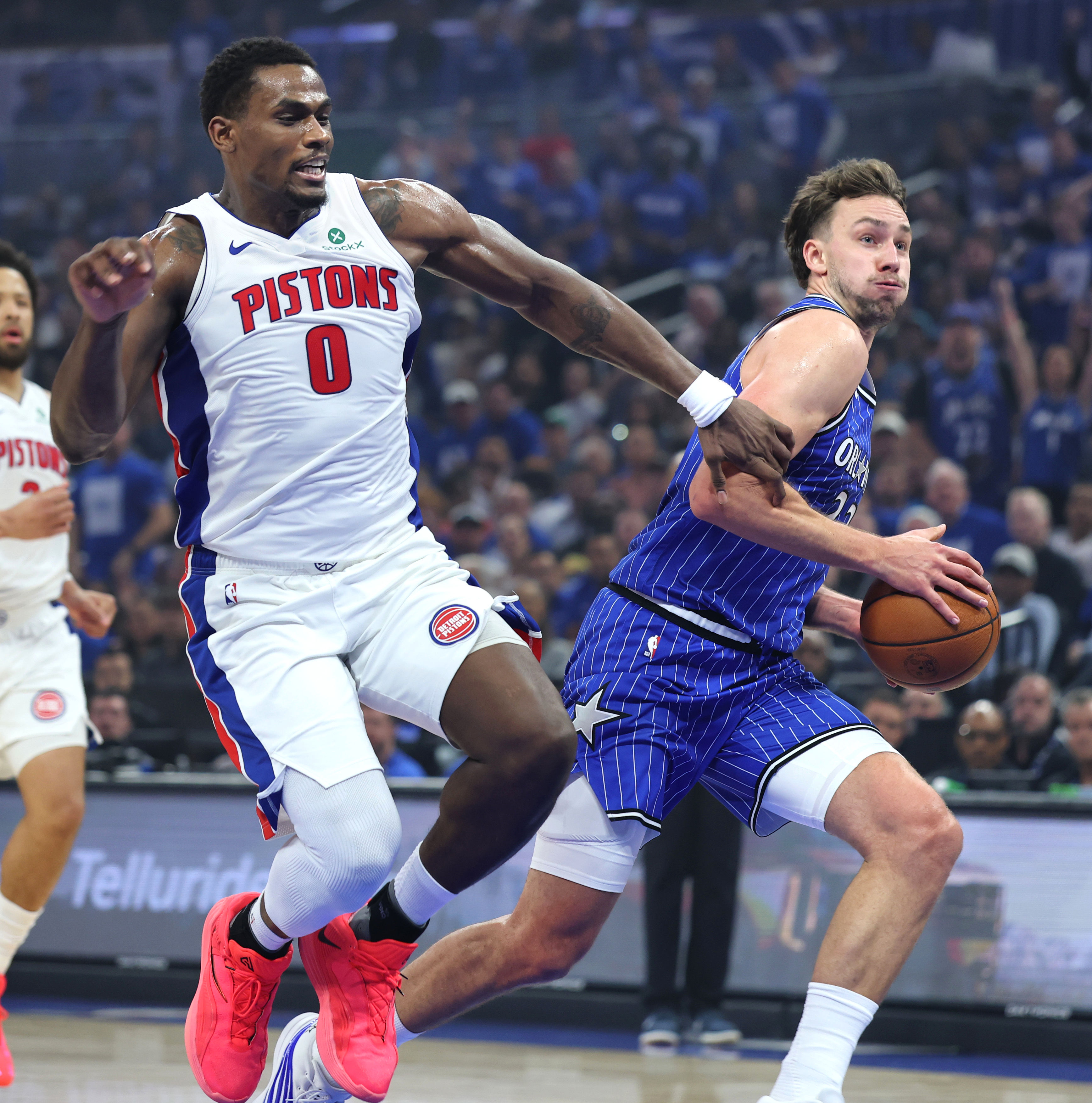 The Orlando Magicâs Franz Wagner (#22) gets fouled by Detroit...