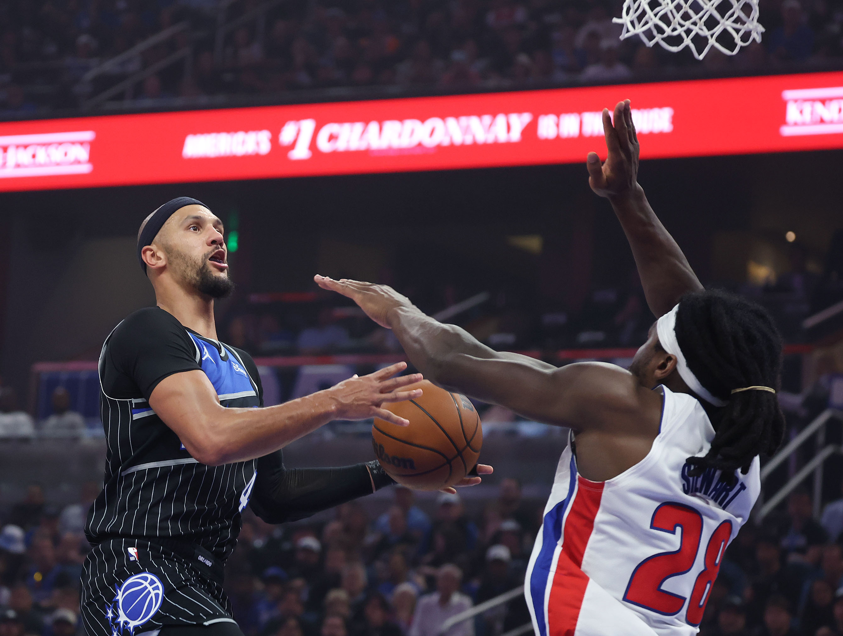 Orlando guard Jalen Suggs (4) eyes a shot as Detroit...